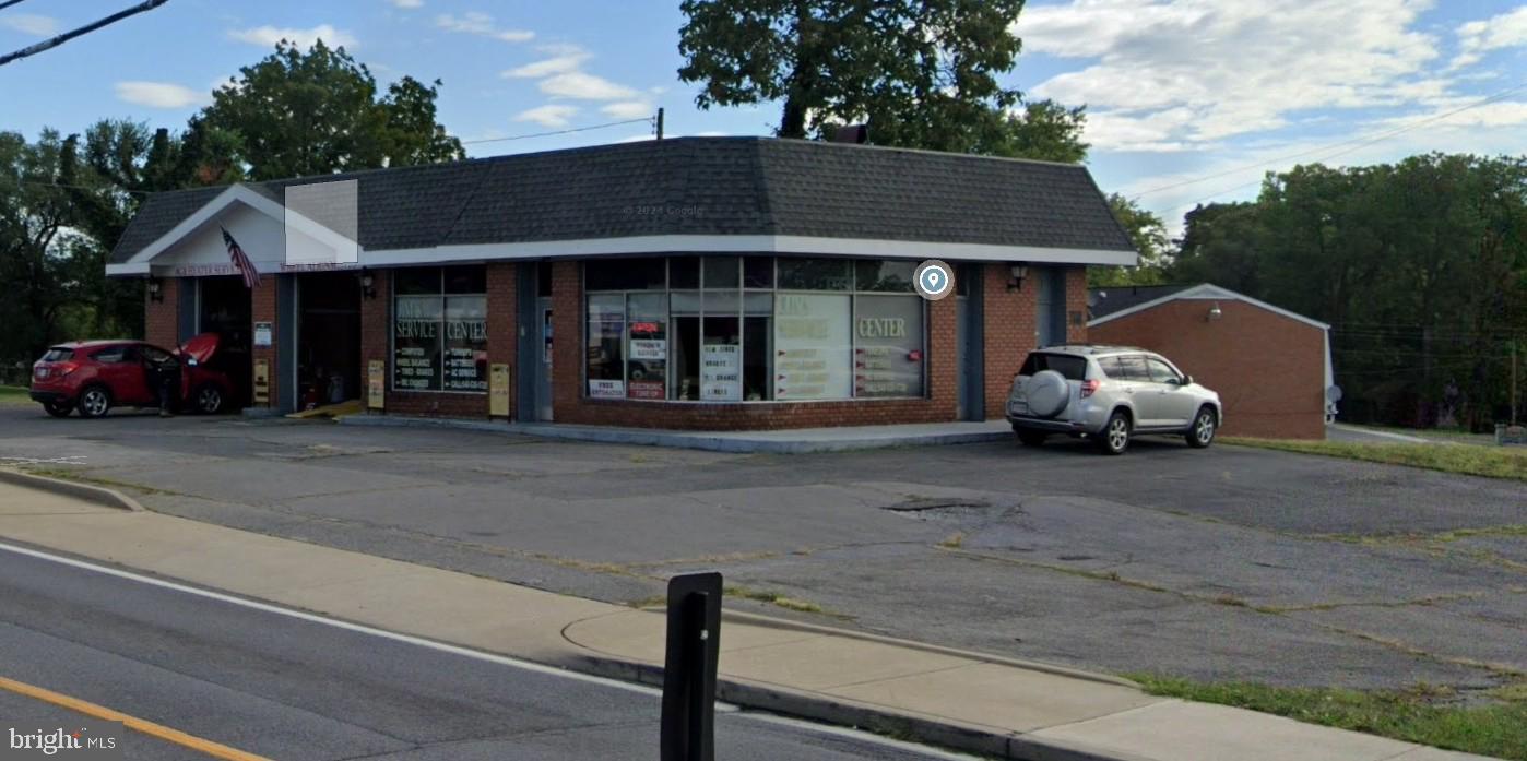 Well established, reputable, and long-standing auto service center in a prime location at the intersection of Millwood Avenue and Pleasant Valley Road directly across from Shenandoah University.   Presently doing business as Jim’s Auto Service Center.  Excellent location, visibility, exposure, and sign location opportunities.  Two bay garage doors equipped with two pneumatic lifts, providing new tire sales, tire repairs, batteries, oil changes, lube and filter replacement, fluids, flushing, belts and hoses, brake services, air conditioning services, wheel balancing, frontend alignment and more.  The sales price includes the business, long-standing list of loyal customers and specified equipment and tools.  Tours by appointment only with the exclusive listing agent.  Call agent now for more details.
