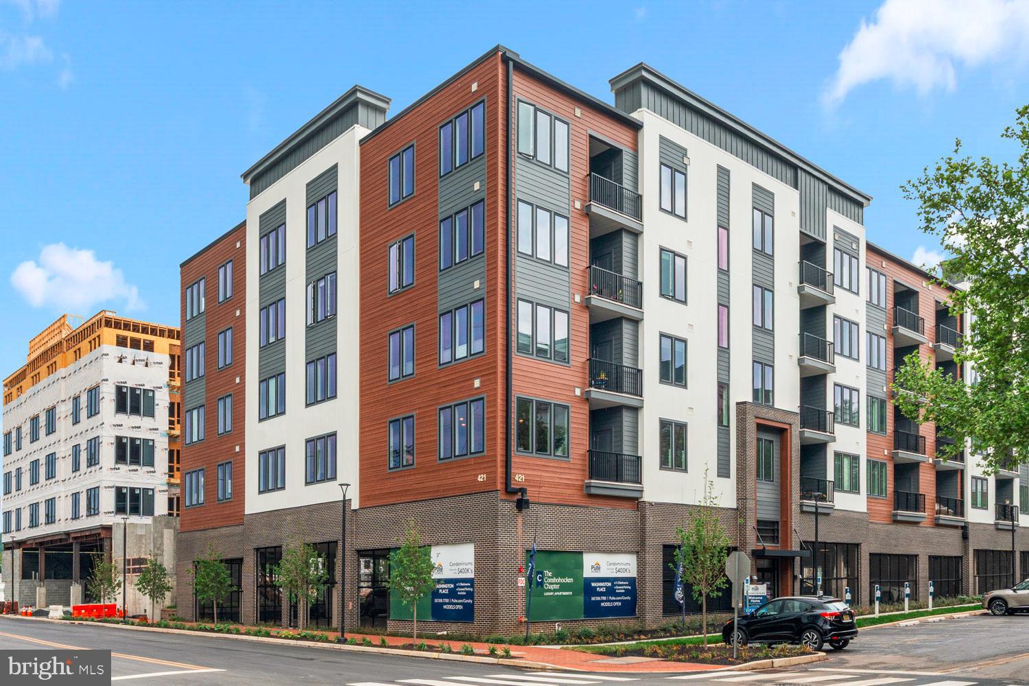 Introducing Washington Place, Conshohocken’s premier new luxury condominium community and a rare opportunity to own brand new construction in one of Montgomery County’s most desirable locations. Thoughtfully built by Pulte Homes
, one of America’s most respected homebuilders, this stunning 2 bedroom, 2 full bathroom residence offers modern design, upscale finishes, and low maintenance living in the heart of vibrant Conshohocken.

Located along the scenic Schuylkill River and within the highly acclaimed Colonial School District, Washington Place is the only new construction condominium community in Conshohocken. Residents enjoy an exceptional lifestyle with resort style amenities including a riverfront promenade, fitness center, luxurious pool, walking and biking trails, beautifully designed BBQ areas, and inviting gathering spaces perfect for entertaining or relaxing outdoors.

Just steps from lively Fayette Street, you’ll love being within walking distance to boutique shopping, popular restaurants, local cafés, nightlife, and the SEPTA station for an easy commute to Philadelphia and beyond.

This beautifully designed Lewis model features upgrades throughout and offers a bright open concept floor plan with hardwood flooring throughout, creating a seamless blend of style and functionality. The modern kitchen flows effortlessly into the spacious living and dining areas, while large windows fill the home with natural light. Step out onto your private balcony and enjoy peaceful water views right from your living room.

The luxurious primary suite offers a spacious walk in closet and a spa inspired en-suite bath complete with a double vanity and oversized walk in shower. A generously sized second bedroom and additional full bathroom provide flexibility for guests, a home office, or additional living space. Additional highlights include a secure Butterfly entry system, pet friendly living, and the ease of brand new construction that is completely move in ready.

Experience sophisticated, maintenance free living in one of the Main Line’s most exciting new communities.