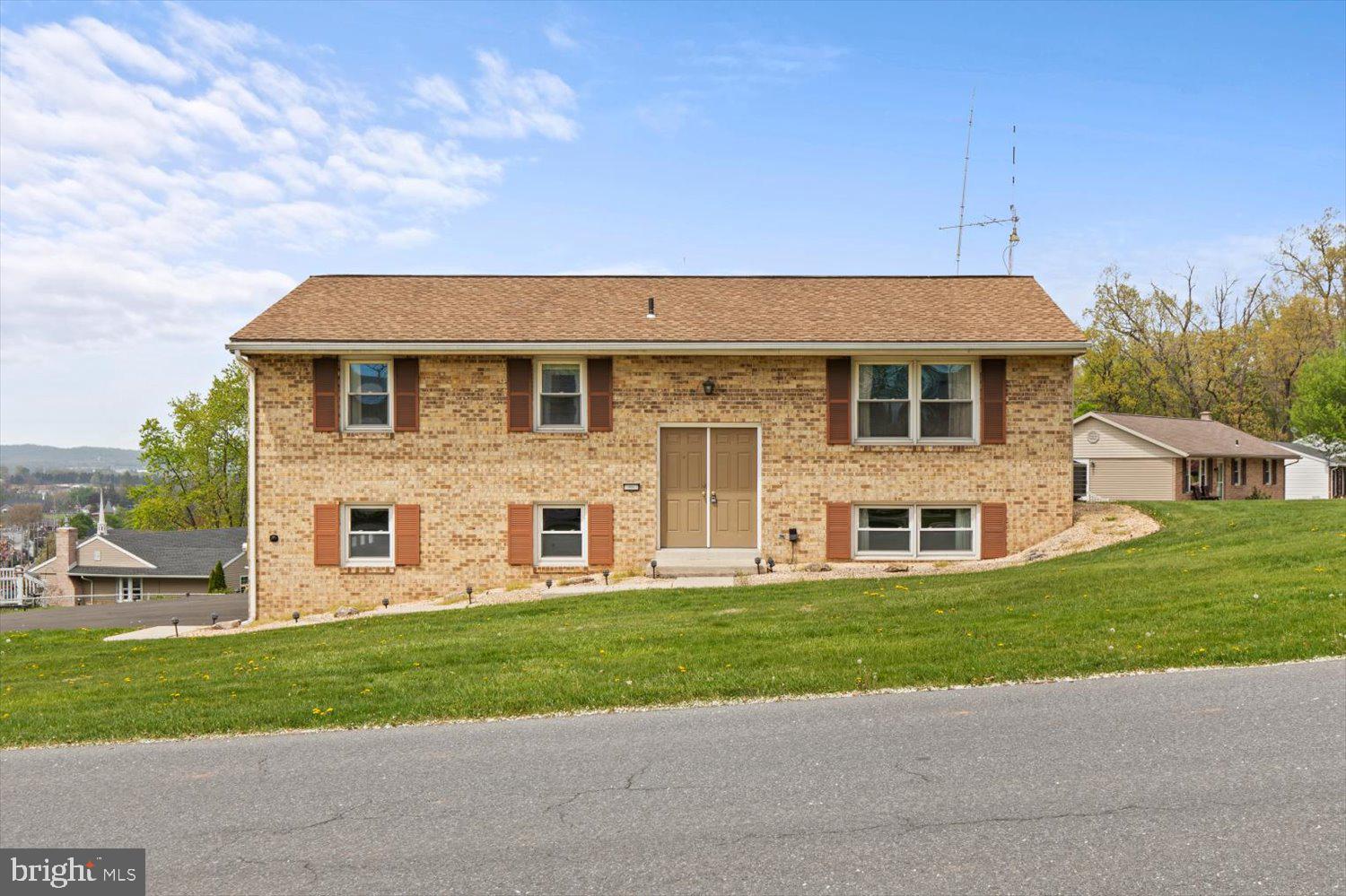 Welcome to 10 E Summit Drive - nestled on a peaceful street in the heart of Reamstown, this well-maintained brick bi-level home is packed with potential and ready for your personal touch. Set on a rare double lot, this property offers both space and value in the sought-after Cocalico School District.

🔹 4-Car Garage – Ideal for hobbyists, car enthusiasts, or added storage.
🔹 Expansive Deck – Perfect for entertaining or relaxing outdoors with a view of the generous backyard.
🔹 Room to Customize – The home has been lovingly cared for over the years and offers a solid foundation for cosmetic updates that will make it shine.
🔹 Flexible Layout – Featuring bright living spaces,  huge 4 seasons room, three comfortable bedrooms, and a versatile lower-level family room.
🔹 Established Neighborhood – Located just minutes from local shops, schools, and commuter routes, yet tucked away in a quiet setting.

Whether you're looking to settle in or invest in a home with great bones and standout extras, this one is full of promise. Come see the possibilities at 10 E Summit Drive!  Showings begin 5/8!