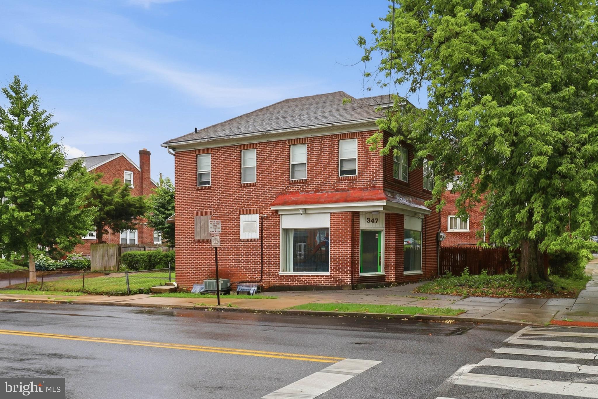 A distinctive two-unit property in the heart of Lancaster City, pairing a stabilized residential apartment with a ground-floor commercial storefront  The upper level offers a 2-bedroom apartment with its own private entrance, currently leased at $1,600/month for immediate, dependable income. The ground-floor commercial space— has been home to professional office space and established salon and aesthetics business for nearly 20 years. It is now vacant and ready for its next chapter. Ideally positioned on a beautiful tree-lined corner just steps from McCaskey High School, the property enjoys strong neighborhood presence and walkability. Whether you're an investor seeking dual income streams, an owner-operator looking to live above your own business, or a buyer drawn to a property with built-in versatility, 347 N Reservoir St is a genuine opportunity in a connected, growing city neighborhood. Schedule your private showing today.