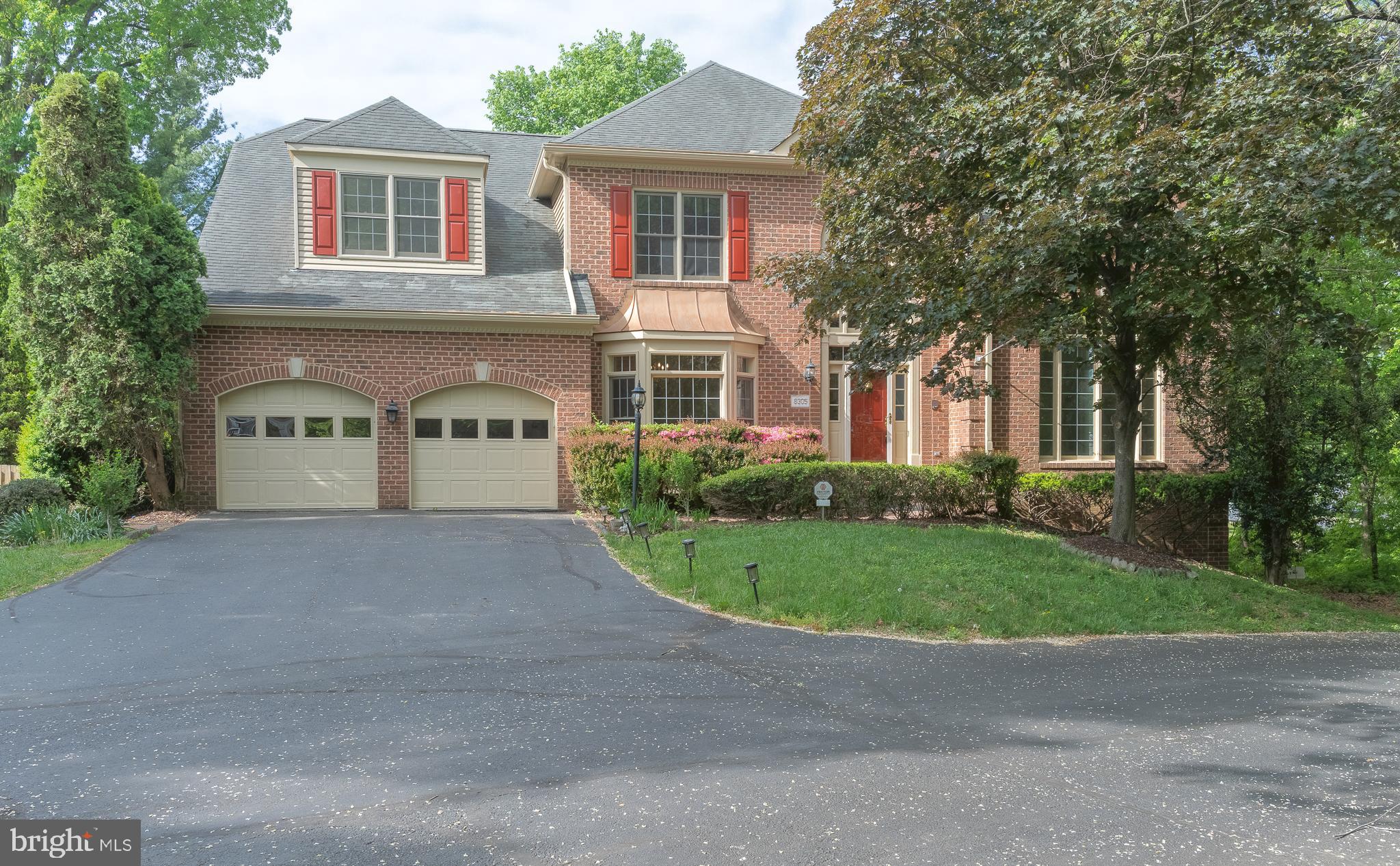 Welcome to this exceptional, move-in ready home situated on a quiet cul-de-sac in one of Vienna’s most sought-after neighborhoods. 8305 Judy Witt Lane strikes the perfect balance between privacy and convenience, offering a peaceful suburban feel just minutes from Tysons Corner, I-495, top-rated schools, and a wide range of shopping and dining destinations. This prime location provides seamless access to everything the DC metro area has to offer.

With over 6,500 square feet of luxurious living space, this home is thoughtfully designed for comfort and versatility. Set on a beautifully landscaped ¼-acre lot, the exterior features a brick-paved patio and garden that create an ideal setting for outdoor entertaining. Inside, you'll find two spacious primary suites—one on the main level and one upstairs—making this an excellent option for multigenerational living.

The grand two-story foyer opens into a formal living room, a formal dining room, a library/home office, and an oversized family room that’s connected to the open kitchen and breakfast room. The finished walk-up basement boasts 9-foot ceilings, a full cherry wood wet bar with a wine closet, a guest bedroom suite, a home Gym/Media room, and a brand-new sauna that has never been used.

Every bedroom is equipped with built-in closet systems, and there’s even a cedar-lined closet for delicate garments. Recessed lighting throughout the home creates a warm ambiance, while features like a central vacuum system add everyday convenience.

Recent upgrades include fresh interior paint, brand-new carpet, a new oven/microwave combo, a new dishwasher, and updated light fixtures, including enhanced recessed lighting. These thoughtful updates ensure the home feels fresh, modern, and move-in ready.

For added peace of mind, the home includes a whole-house security system and an automatic standby gas-powered generator that activates within 30 seconds of a power outage, providing uninterrupted comfort and security. The low HOA fee includes trash collection as well.

This home truly offers the full package—generous space, stylish upgrades, thoughtful details, and an unbeatable location—all tailored for modern living and effortless entertaining. Don’t miss your chance to own this exceptional and beautifully maintained residence in the heart of Vienna.