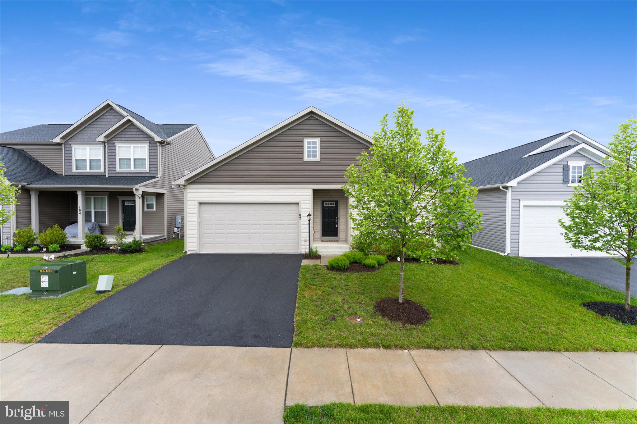 Welcome to the Pendleton model, a beautifully maintained one-level home offering comfort, functionality, and a partially finished basement – totaling approximately 2,056 finished square feet! From the moment you step inside, you’ll notice the elegant engineered wood flooring flowing through the living and kitchen areas, setting a warm and modern tone.
The heart of the home is the open-concept kitchen, featuring a generous island perfect for entertaining, meal prep, or casual dining—all overlooking the inviting living room. The primary suite is thoughtfully designed with two walk in closets and a private bathroom complete with a step-in shower.
Convenience is key with a main-level laundry area that includes a washer and dryer, which convey with the property. A second full bath with a tub/shower combo serves the additional bedrooms and guests.
Downstairs, the partially finished basement adds valuable living space with a cozy family room and a radon mitigation system already installed for peace of mind. There are two additional rooms that can be finished and a rough in for a full bath in basement. Walk up basement! 
Enjoy outdoor living on the low-maintenance composite deck, which leads to a fully fenced backyard—ideal for pets, play, or just relaxing in the fresh air. Additional features include ceiling fans throughout, a Culligan water softener, and a security alarm system.
This home truly has it all—style, space, and smart upgrades—ready for you to move right in!
Come live in Snowden bridge! Priced to Sell! Amenities include pools, daycare, dog paths, playgrounds, basketball courts, walking distance to elementary school, close to shopping and commuter routes! Won't last long come see it today!