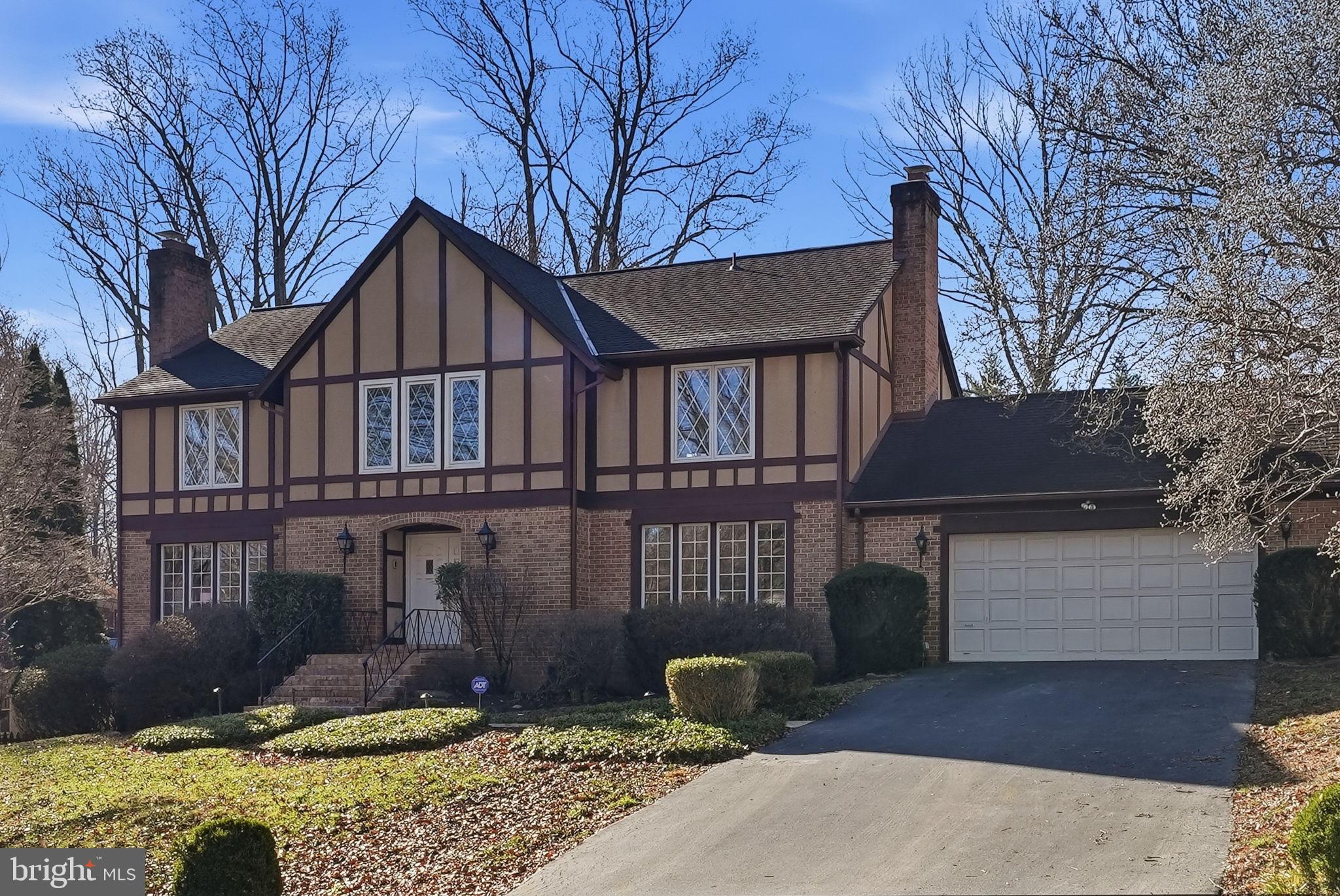 Elegant Tudor-style home offering nearly 5,000 square feet of living space, ideally situated on a private cul-de-sac in sought-after McAuley Park and set on a beautifully landscaped lot just under one-half acre.
A welcoming formal foyer with tile flooring opens to the formal living room on one side and the family room on the other, with views of the striking staircase leading to the upper level. The main level features hardwood floors throughout and includes a formal living room and formal dining room with chair rail and crown molding, perfect for entertaining.
The spacious kitchen offers an island, pantry, double ovens, and an eat-in dining area overlooking the backyard. The family room features a wood-burning fireplace and wet bar, creating a warm and inviting gathering space. Also on the main level are a private office,  a half bathroom, laundry room, access to the backyard deck, and entry to the two-car garage.
Upstairs, hardwood floors continue throughout. The primary suite offers a walk-in closet and a spacious bathroom with double vanities, soaking tub, and separate walk-in shower. Four additional bedrooms and two full bathrooms complete this level, including a Jack and Jill bathroom shared between two bedrooms.
The expansive lower level provides over 1,500 square feet of additional living space, including a large recreation room, full bath, den (ideal for guests, a gym, or additional office space), and generous storage area. This level also provides walk-out access to the side yard.
Enjoy outdoor living on the large deck overlooking the flat, serene backyard, perfect for entertaining, play, or relaxation.
A rare opportunity to own a spacious home in one of the area’s most desirable neighborhoods.