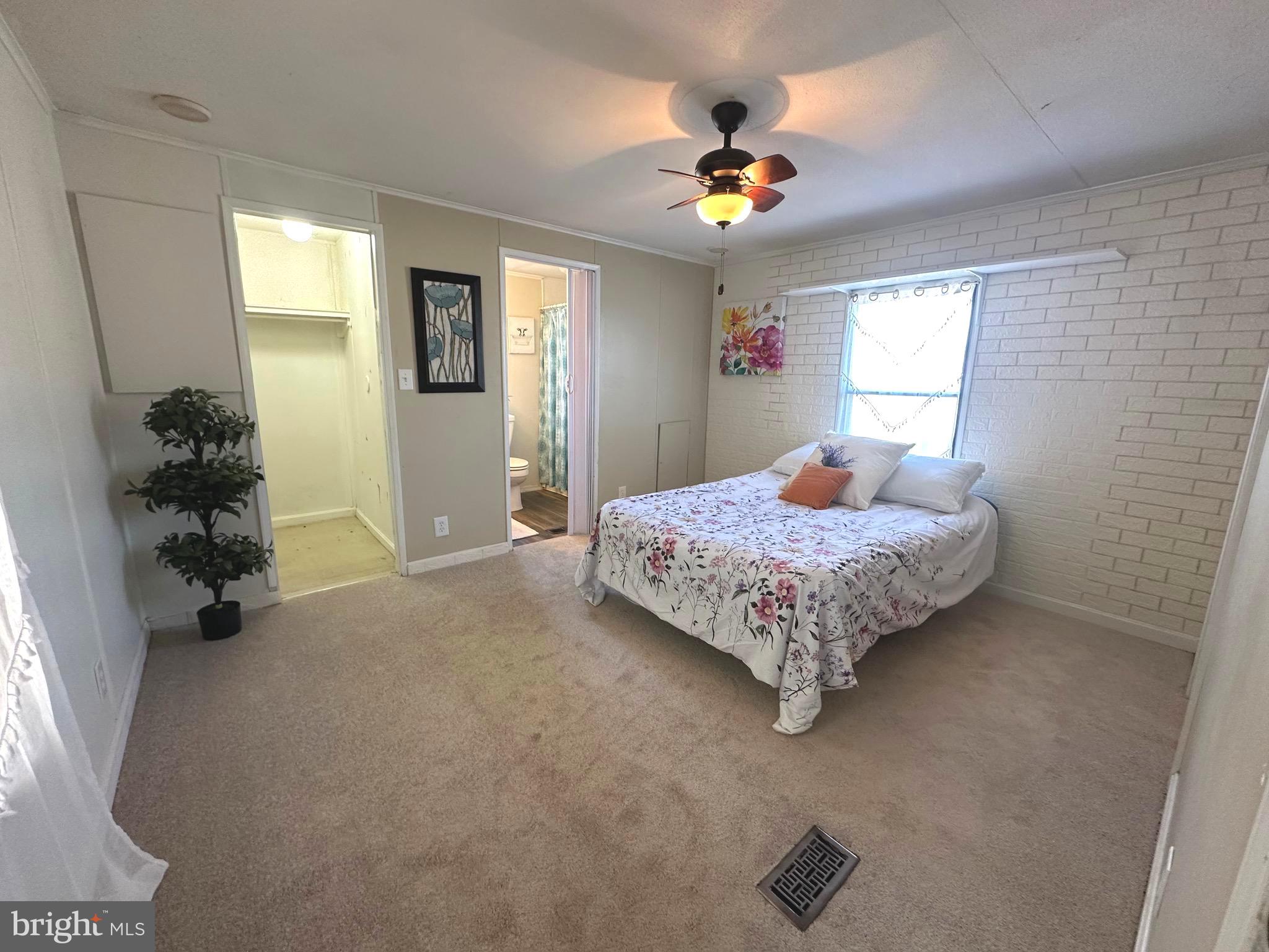 Owner says bring a reasonable offer! Welcome home to this spacious 4-bedroom, 2-bath mobile home set on a pleasant, tree-lined street. A welcoming covered porch leads you inside to a comfortable living room complete with a cozy fireplace—perfect for relaxing evenings. The kitchen is open to the living space for being together, and has been update, with an almost new refrigerator. The separate dining room offers plenty of space for gatherings, while the well-designed layout places the primary bedroom at one end for added privacy. The primary suite includes its own full bathroom with jacuzzi tub and 2 walk in closets, with three additional bedrooms and a second full bath providing room for everyone. All bedrooms have brand new carpet. Outside are 2 covered porch areas and 2 large sheds for storage. With its generous layout, inviting features, and great location, this home is ready for its next owner to bring fresh ideas and make it their own. 
With ownership in Williams Estates, park approval is required. Lot rent for this property is $1036 per month, which includes tot lot, community center and water.   Welcome home to 3532 Wagon Train Road!