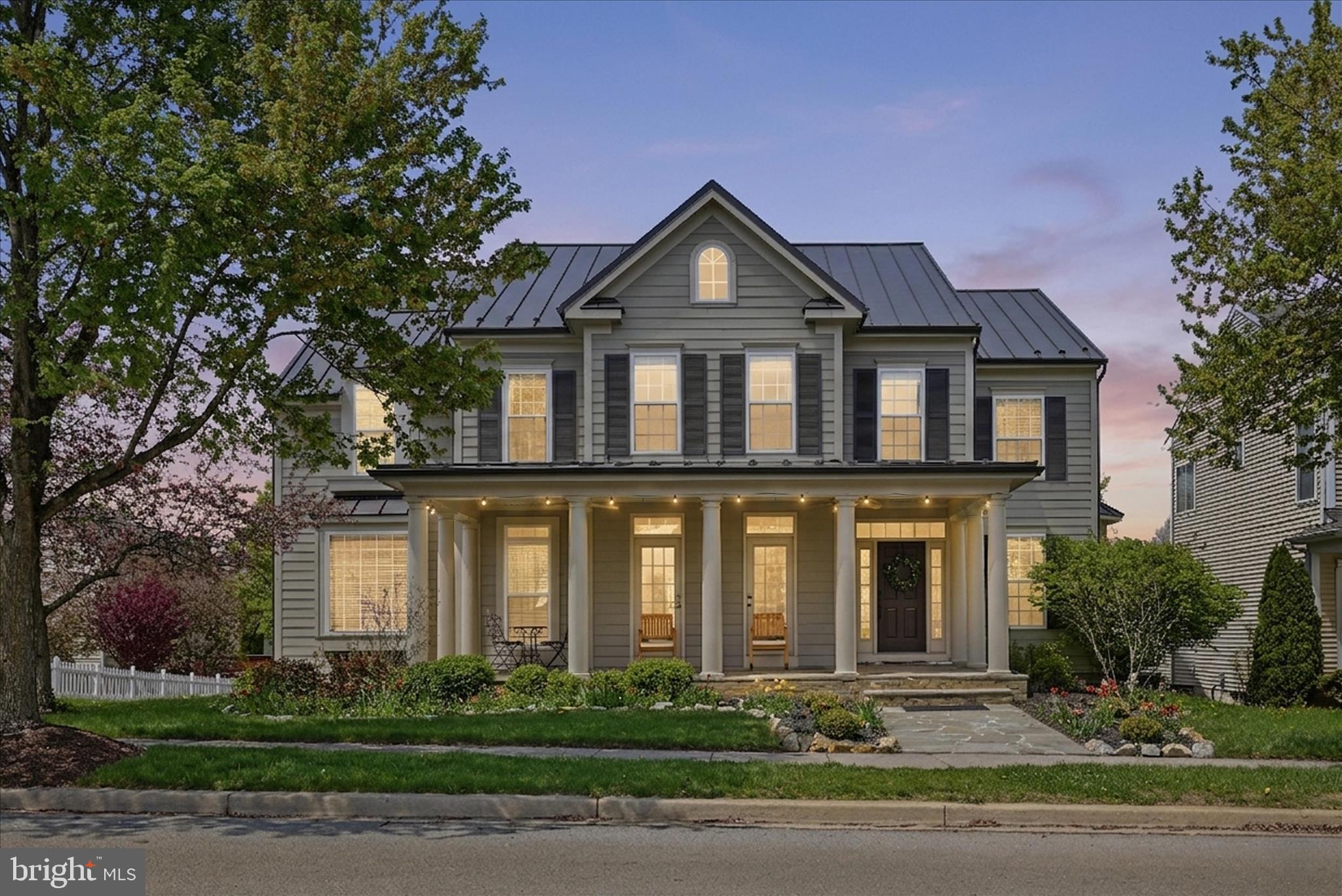 Welcome to 218 Braddock Street in the highly sought-after Huntfield community in Charles Town, West Virginia, offering the perfect blend of space, lifestyle, and commuter convenience in Jefferson County WV. This beautifully maintained 4 bedroom, 3.5 bath Colonial home features an open and functional floor plan with hardwood flooring, abundant natural light, and multiple living areas designed for today’s buyers. The gourmet kitchen is ideal for everyday living and entertaining, complete with stainless steel appliances, a six burner gas range, butler’s pantry, wet bar, and spacious breakfast area, all opening to a comfortable family room with gas fireplace. The upper level offers a luxurious primary suite with a private sitting room, oversized walk-in closet, and spa-inspired bath, along with three additional generously sized bedrooms and convenient upper-level laundry. The finished lower level provides flexible space for a recreation room, home gym, media room, or guest suite. Outdoor living includes a welcoming front porch, expansive rear deck, and fully fenced backyard. This home is uniquely positioned directly in front of the community courtyard, creating a front-row seat to neighborhood events such as holiday celebrations, pictures with Santa, pony rides, movie nights, and community gatherings. Huntfield residents enjoy exceptional amenities including tennis courts, basketball courts, two playgrounds, and a soon to open pool and clubhouse.  Ideally located for commuters to Northern Virginia, Maryland, and Washington DC, and just minutes to historic downtown Charles Town, shopping, dining, and entertainment.