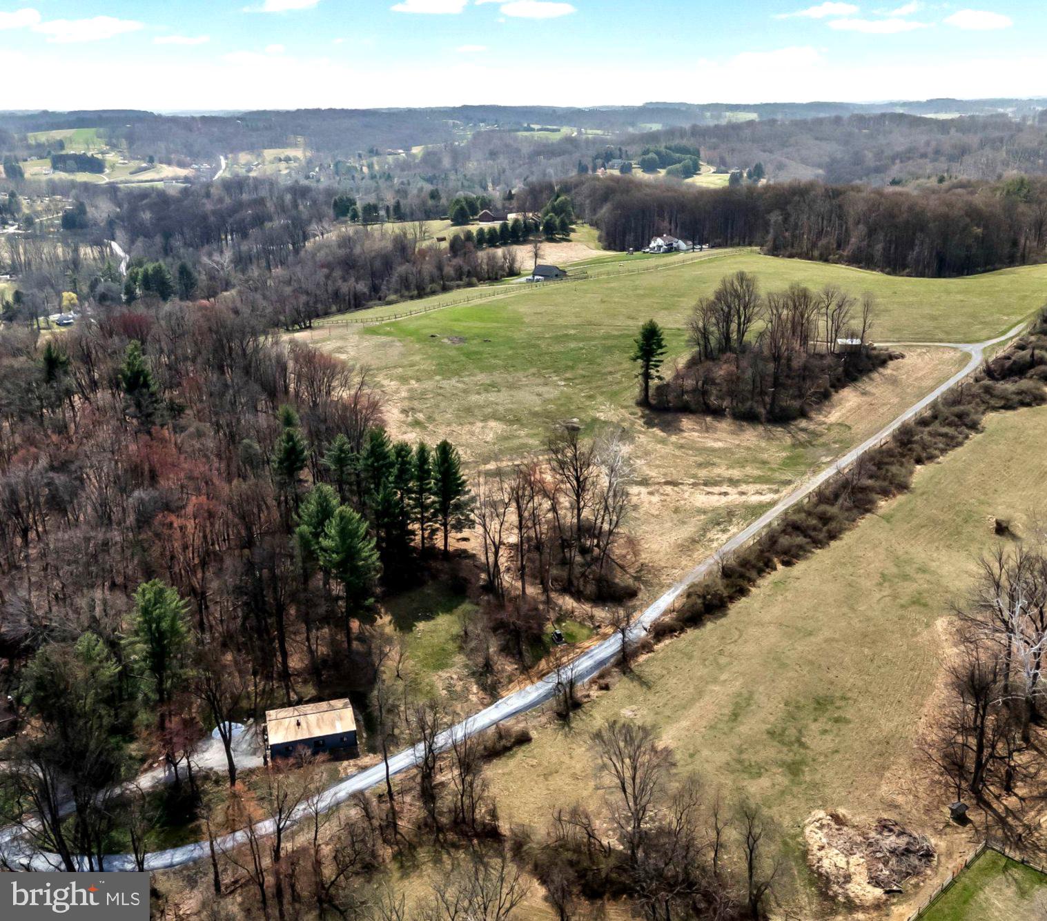 Gorgeous Chester County Property for Sale – over 24 Acres in Newlin Township
This rare property, nestled in an area renowned for open space conservation, offers stunning views of ChesLen Preserve. Located on one of the highest hills in Chester County, it’s ideal for equine enthusiasts or those seeking a peaceful retreat. The land is cleared and ready for your dream home, with easy access via a new gravel driveway. The property includes a recently renovated pole barn, converted into a 3-bedroom, 2-bath rental currently bringing in $3,150/month. There’s also a large shed for farm equipment. With electricity running to the top of the property and most of the land fenced with deer fencing, the possibilities are endless. Enjoy outdoor recreation with nearby hiking/riding trails in ChesLen Preserve, and explore local shops, restaurants, and fresh produce markets. Located within the Unionville Chadds Ford School District, and just a short drive to Philadelphia and Wilmington.  ACT 319 for low taxes. Don’t miss out—schedule your appointment today!  Please do not enter property without appointment.