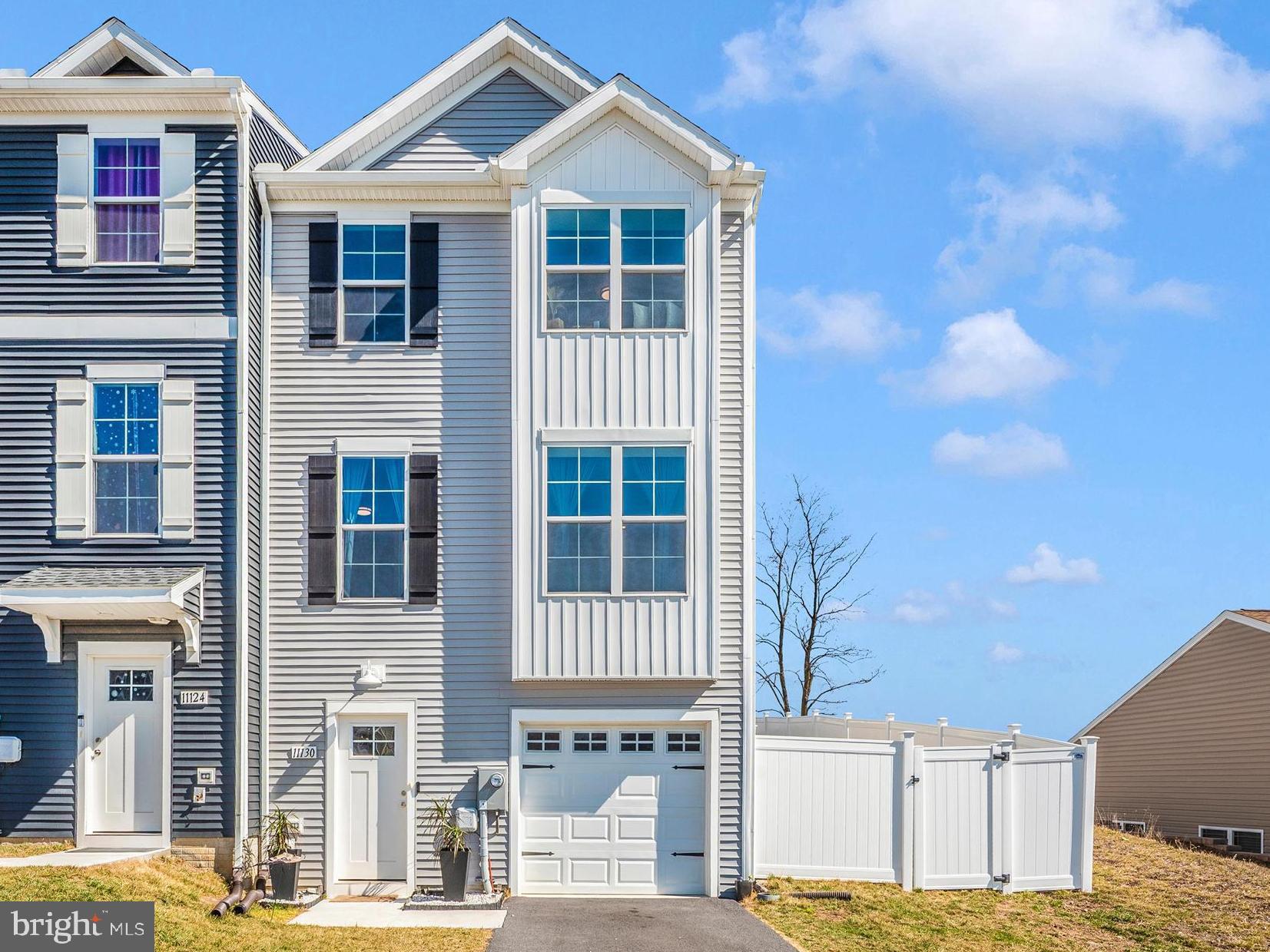 END UNIT at the price of an interior unit! Built in 2023, this beautifully maintained townhouse in Farmspring Estates offers extra privacy with only one shared wall plus valuable upgrades already completed for you.
The flexible 14x19 bonus room on the main level is perfect as a guest room, family room, playroom, office, or home gym. The open-concept main living area features granite countertops, stainless steel appliances, a large island, pantry, recessed lighting, and abundant natural light throughout.
Upstairs, the spacious primary suite includes a walk-in closet and private bath, along with two additional bedrooms and convenient upper-level laundry.
Enjoy outdoor living on the composite deck overlooking the fully fenced backyard with a 6-foot vinyl privacy fence — a major upgrade rarely found at this price point.
Attached garage and driveway parking offer convenience, with an HOA pre-approved option to expand the driveway for additional parking if desired.
Community amenities include a pool, tot lots, and community center. Move-in ready and loaded with upgrades, this home is an exceptional value.
Price reduction and seller concessions offered — motivated sellers welcome your showing and offer!