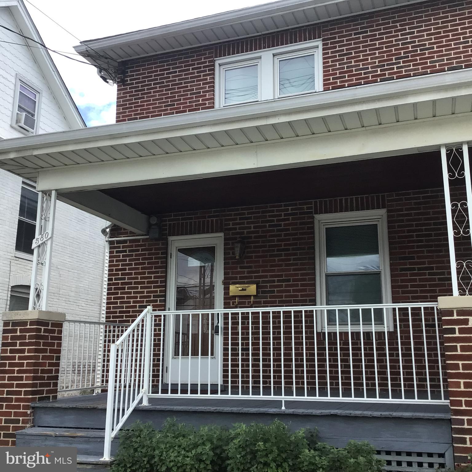 Nice two story brick duplex in Chambersburg Boro. Three bedrooms and two full baths. Economical Gas furnace and gas hot water. Full basement with cabinets,  work space, laundry, and walk- out steps. Walkup floored attic. Second floor covered balcony. Recent new shingled roof and new front sidewalk. Replacement vinyl windows. Large eat- in kitchen with lots of cabinets. Rear porch and sidewalk leading to a two car detached garage.