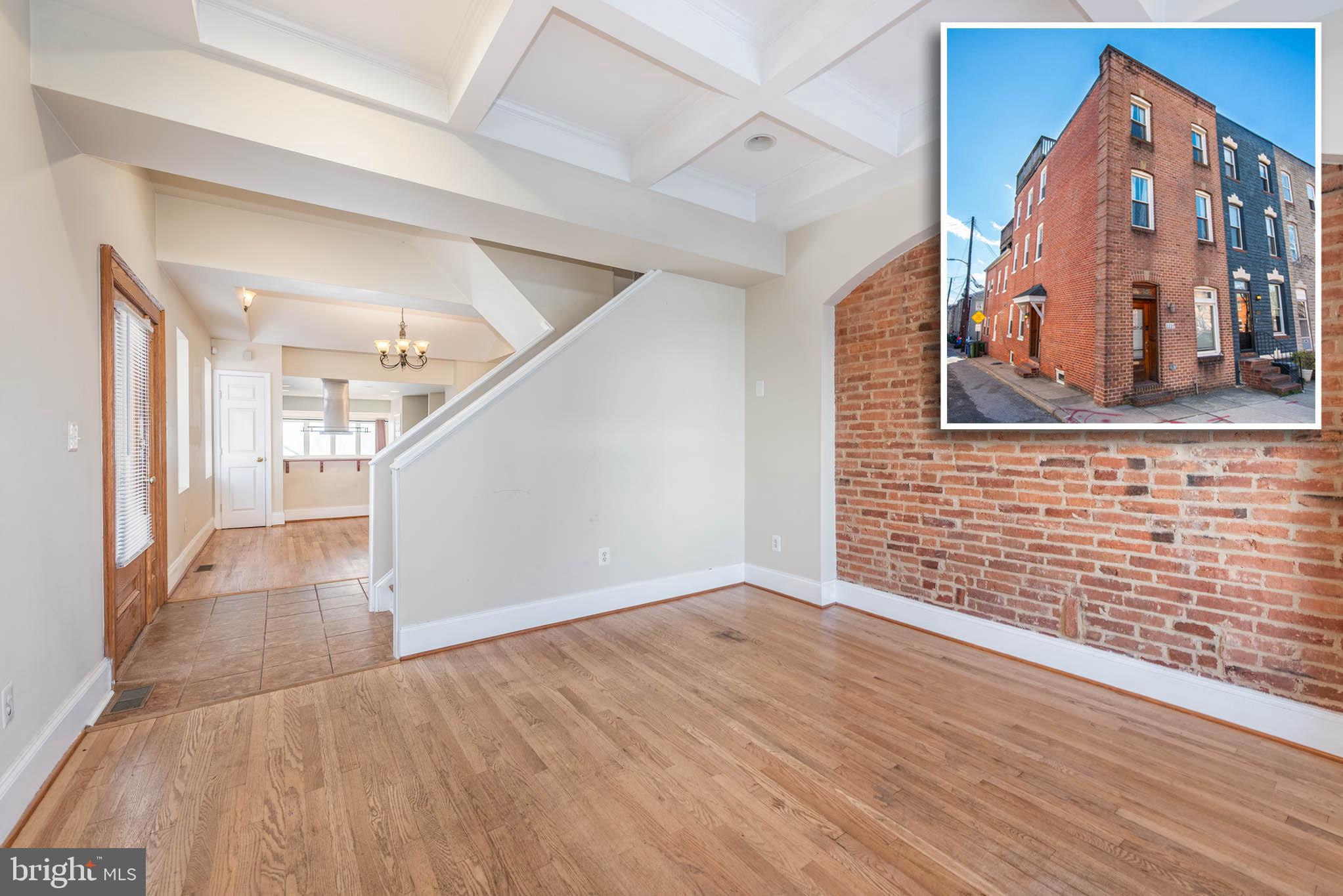 INCREDIBLE RENTAL OPPORTUNITY WITH ROOFTOP DECK AND 2 CAR PARKING!  This one has it all - over 2,000 sq. ft. of living space spanning 4 finished levels.  Main level has a spacious living room with a coffered ceiling, separate dining area, gourmet kitchen with a breakfast area, and a convenient half bath.  2nd level has 2 bedrooms and 2 full baths including a Primary bedroom suite with a walk-in closet and spa bath with a large soaking tub and separate shower.  The 3rd level has a bedroom suite with a full bath and rec room with a wet bar that leads to the 2 tiered rooftop deck with incredible city and water views.  The basement is finished with a bonus room with additional storage space and the parking pad for 2 cars makes parking a breeze.  All this and located steps from Patterson Park!  Must have good credit and income to be considered with no history of evictions.