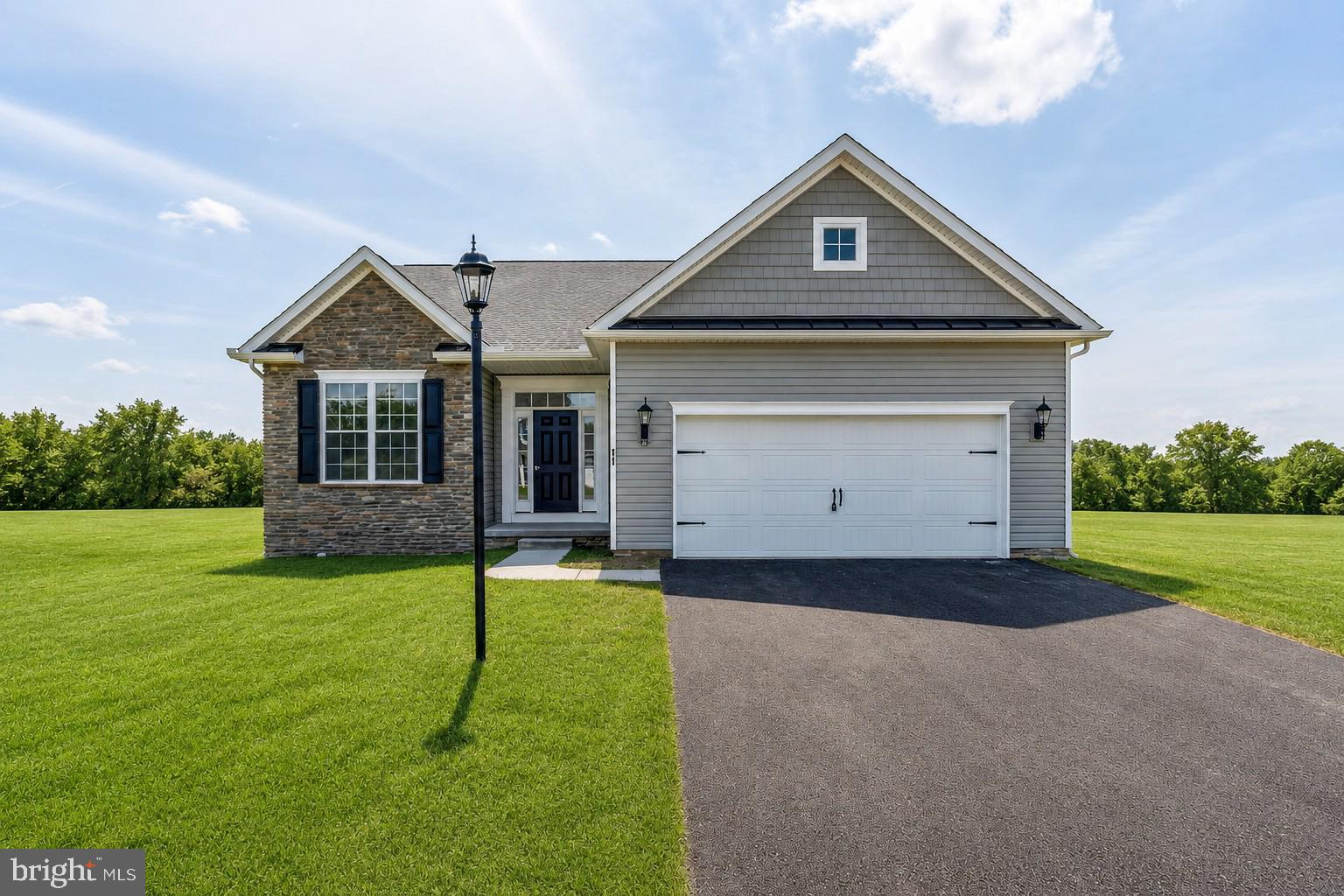 ***TO BE BUILT BASE PRICE LISTING***
SPECIAL INCENTIVES MAY BE AVAILABLE WITH THE USE OF A PREFERRED LENDER AND TITLE COMPANY

The Marie offers comfortable and easy living. Greet your guests on the porch and store coats and shoes in the foyer closet. Pull your car into the spacious two-car garage and enter your home directly into the family room.  The lovely one-story home features a gorgeous owner’s suite with full bath and walk-in closet, as well as two additional bedrooms with plenty of closet space and a full bath. The home offers a convenient first-floor laundry room with washer and dryer hookup, furnace, and water heater. The lovely kitchen offers plenty of cupboard space with a bar and an adjacent dining room that leads to a beautiful private patio