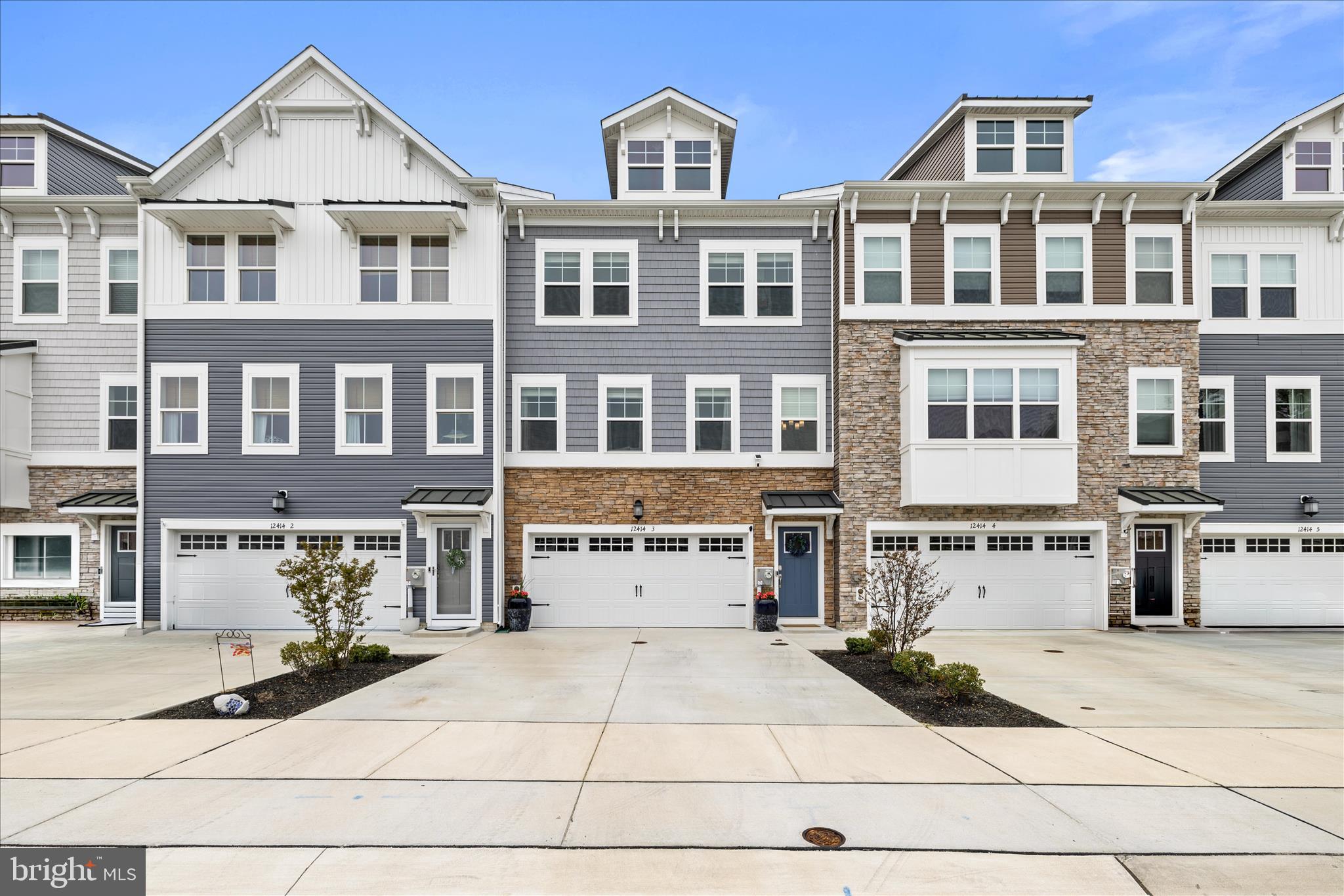 Price adjusted to below $500K--move on this one fast!! Welcome to Sea Oaks Village— coastal living, affordability, newer construction built in 2023, and so close to all of your everyday conveniences! Located in West Ocean City just 2 miles from the Ocean City inlet, beach, boardwalk, shops, and dining--and about a 10 minute drive to the beauty of Assateague!

This upgraded 3-level townhome offers 2,664 sq ft with 3 bedrooms, 3 full baths and one half bath. An added first floor, flexible bonus space is perfect for guests, family room or home office. On the second floor, enjoy an open floor plan  main level with a living room that flows into the spacious kitchen offering the gourmet package with hood vent, double wall ovens, and under counter microwave. The oversized Frost White Quartz island is great for great casual dining and entertaining space plus there's a dining area overlooking the rear deck, an expansive walk-in pantry, a coffee/wine butlers nook area and a 1/2 bath. 

Upstairs features a private primary suite with walk-in closet and a large primary bathroom with double sink vanity, private toilet room and walk-in shower.  Also located upstairs is a convenient bedroom-level laundry and two additional bedrooms with a shared full bath with tub shower  in the hall.

Relax on oversized rear decks, one on the ground level offering elevated paver patio and one on the 2nd floor main level--both  overlooking the private wooded area at the rear of the home, ideal for morning coffee or evening hangouts. 

Sea Oaks Village offers numerous amenities all for the monthly HOA fee of $134. Amenities include in ground community pool, playground, pickleball/basketball courts, trash removal and lawn maintenance. This home's location offers parking for up to 4 vehicles (2 in garage, 2 outside garage) plus it's near the rear of the community convenient to the community pool with additional parking nearby. Deferred water/sewer fee paid annually in the amount of $446. Another great perk to note--no Ocean City taxes!