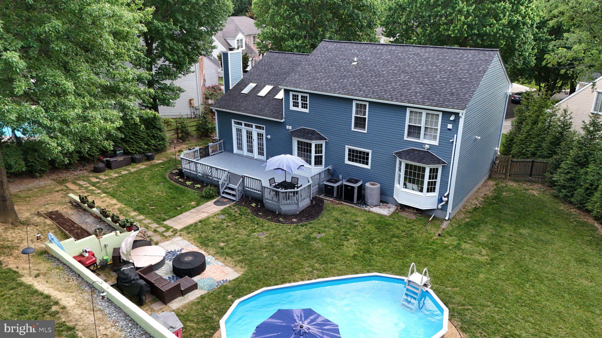 This stunning Colonial-style residence offers a perfect blend of elegance & comfort. Here you will enjoy a combination of large square footage & large unassuming & exploding backyard with no need to compromise. Located on the East side, where the largest lots in the community are located. Spanning 2,675 square feet above grade with an additional 1080 square feet below grade for a total of 3755 square feet of fully finished space. This meticulously maintained home features 5 spacious bedrooms & 3.5 bathrooms, making it an ideal sanctuary for those seeking both space & style. Step inside to discover an inviting open floor plan adorned with exquisite details such as chair railings and crown moldings that enhance the home's sophisticated ambiance. The heart of the home is the expansive living area, where natural light pours in through the windows and skylights, creating a warm & welcoming atmosphere. A cozy fireplace with glass doors and a classic mantel serves as a focal point, perfect for gatherings or quiet evenings at home. The gourmet kitchen with white cabinet, black knobs & hinges for contrast is a chef's dream, equipped with upgraded countertops, a cooktop, wall oven, & a suite of newer appliances including a front-loading washer & dryer. Retreat to the primary suite, a tranquil haven featuring an en-suite bathroom designed for relaxation, complete with modern fixtures & ample storage. Each additional bedroom is generously sized, providing comfort and privacy for all. The outdoor space is equally impressive, set on a 0.47-acre lot that backs to lush trees, offering a peaceful backdrop for outdoor activities. The property features a personal above-ground oval pool 24x12, perfect for summer relaxation, and a deck that invites al fresco dining and entertaining. The landscaped yard is thoughtfully designed, providing a play area with equipment for outdoor fun & installed 100-foot retaining wall with electricity that extends the flat area perfect for unlimited fun & entertainment. Additional highlights include a fully finished basement with a bar & 2 sump pumps & an additional room or perhaps a movie room. A two-car attached garage with WIFI garage door openers & ceiling racks for more storage. The home is equipped with a security system with exterior sirens & CCTV (CAT6) prewired ensuring peace of mind. With its prime location in a cul-de-sac, this residence combines luxury living with the tranquility of nature, making it a perfect choice for those seeking a harmonious lifestyle. Experience the beauty & comfort of this exceptional home, where every detail has been thoughtfully curated for modern living. 

Location: Located off Middlebrook road & Warring Station road with easy access to I-270, Rt 355, Great Seneca, Clopper Road & I-200. Almost everything is located with a 5-10 minute drive to include: Middlebrook shopping center with tons of shopping and dining, Giant and Safeway grocery stores and Wegmans at the Milestone Shopping Center, Gold’s Gym, Black Rock Center for the Arts, Missions BBQ, Starbucks, Adventist Healthcare, Holy Cross Hospital, 1.1 miles from Top Golf, Walmart 1.9 miles away & the list goes on!

Additional features: New gutters 5/2026, new siding 5/2024, new roof 11/2021, new pool pump 5/2026, new attic cooling fan 5/2026, fresh paint throughout most of the home 4/2026, updated all vanity tops 4/2026, 2 primary bedroom walk-in closets with custom closet system, freshly painted 2-car garage with coated epoxy floors, 10x10 Tarter Elite Heavy-Duty Wire Dog kennel, 10x16 handcrafted Amish shed with bran new roof 5/2026, fully fenced yard with French drains, super private with mature privacy hedges. Experience a daily retreat right in your backyard! Don't miss this one!!! Call 4 more info!