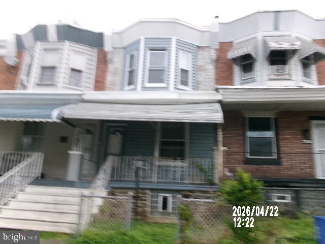 interior 2 story row home features a front porch, basement, three bedrooms, one full bath,half bath,public water and public sewer with on street parking.