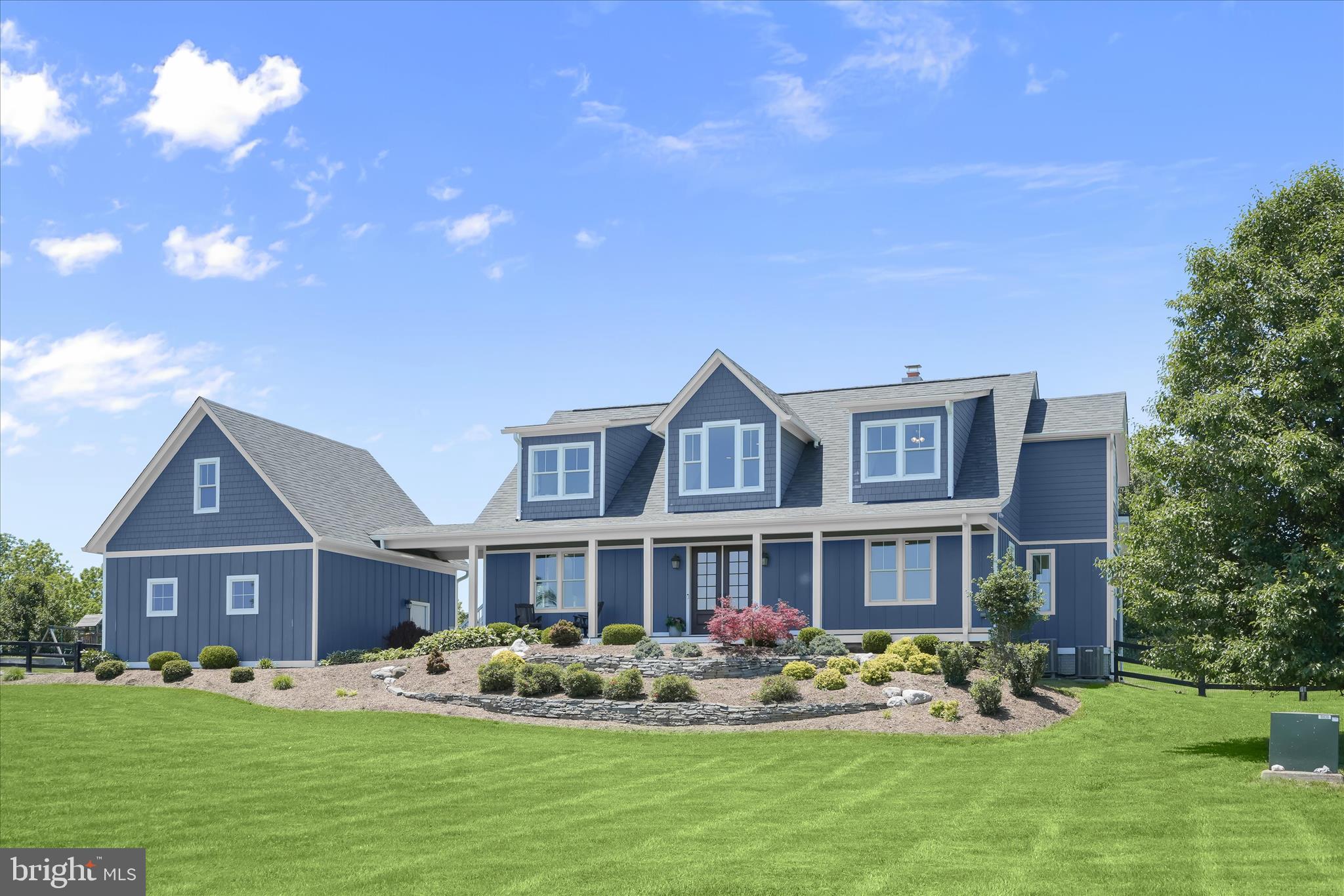 SAVE THE DATES- OPEN HOUSE 6/12-6/14 WITH BARTENDER ON 12TH! 
Welcome to the perfect blend of luxury, comfort, and countryside charm in the heart of Hamilton. Nestled on nearly four picturesque acres in Virginia's renowned wine country, this custom-built estate offers an exceptional lifestyle where peaceful surroundings meet everyday convenience.

With five spacious bedrooms and four-and-a-half baths, this thoughtfully designed home was built for the way people truly live. The highly desirable main-level primary suite provides a lavish bath, custom closet and access to the deck, making the home equally appealing for growing families and those seeking the ease of main-level living.

At the heart of the home, an expansive open-concept floor plan creates a seamless flow between living spaces. The dramatic two-story family room showcases soaring ceilings, abundant natural light, and a stunning wood-burning fireplace that invites gatherings year-round. A dedicated main-level office provides the perfect work-from-home retreat, while the dream mudroom, laundry, and pantry combination, conveniently located just off the garage catwalk, offers the kind of organization and functionality every homeowner desires.

Upstairs, four generously sized bedrooms are complemented by two full guest baths, creating comfortable accommodations for family members and overnight guests alike. The beautifully finished lower level expands the home's versatility with a spacious recreation area, wet bar, full bath, and dedicated exercise room. Ideal for entertaining, hosting game nights, or creating your own private wellness retreat, the possibilities are truly endless. 

Step outside and discover your personal backyard resort. The fully fenced rear yard surrounds a spectacular heated saltwater, gunite pool featuring a tanning ledge, generous depth (7.5') for swimming and play, and the perfect setting for summer gatherings, evening cocktails, and endless family memories.

Beyond the property itself, the location is truly exceptional. Positioned between Leesburg and Purcellville, you'll enjoy easy access to shopping, dining, commuter routes, top-rated schools, and everyday conveniences while still embracing the beauty and tranquility of Western Loudoun County. Award-winning wineries, breweries, farm-to-table restaurants, scenic trails, and rolling countryside views are all moments away, allowing you to fully experience the lifestyle that makes DC's wine country one of the region's most sought-after destinations.

Whether you're searching for room to grow, a place to gather generations, or a forever home designed for comfortable living and effortless entertaining, this extraordinary Hamilton property delivers a lifestyle that's as beautiful as the setting itself. Welcome Home!