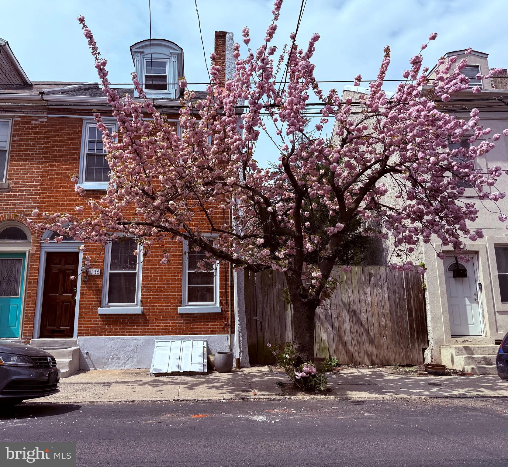 Lovely Spacious Sunny Home, recently refreshed in Northern Liberties.  Near all of the neighborhoods  great amenities: Liberty Lands, great restaurants, shops and public transportation. Entry Foyer with marble tile floor.  Living Room/ Dining Room combination both with working fireplaces and Pennsylvania blue marble mantels,  pine floors laid on the diagonal. Laundry and Powder Room with Quarry Tile floors. Updated Eat-In Kit, with tile floor,  bamboo countertop, eat in banquet, lots of pantry and storage space.   Exit out Sliding Glass Doors to brick patio and planted area.    Wide Elegant Stair with Skylight to the 2nd floor. Rear Bedroom, with oak floors and new windows, Hall Ceramic Tile Bath and linen closet. Hall closet. Front Main Bedroom Suite, with ceiling fan, bamboo floors, new windows and working fireplace. Pass through the closets to ensuite tile Bath with shower. Hallway with bamboo floors. 3rd Floor Large Dormered Bedroom., new windows, ceiling fan and oak floors. Central Air,  Roof new March 2026,  HVAC system 5 years old.  The waterproofed Basement has mechanicals and plenty of storage.