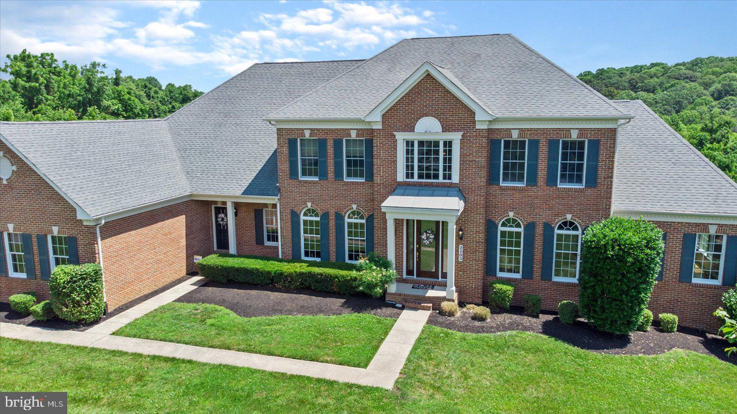Truly Remarkable 5 Bedrooms, 5 Full Bathrooms, 2 Half Bathroom Home Sitting On 2 Acres In This Luxurious Spacious Community Of Willow Farms Village! Upon Entering The Home, You'll Immediately Notice The 9ft Ceilings, Crown Molding, Gleaming Hardwood Floors & Natural Lighting Throughout The Home.  The Main Level Offers A Formal Living Room, A Spacious Sun Room Complete With A Large Palladian Style Window, A Formal Dining Room With Butlers Pantry, A Living Room Which Is Complete With  A Fireplace Pellet-Stove (Perfect For Those Wintery Nights)  Office/Study & Laundry Room. Continuing Throughout The Main Level Is The Dining Room/Kitchen Which Offers Stainless Steel Appliances, Granite Countertops, Large Pantry & Extensive  Kitchen Island With Breakfast Bar. The Upper Level Includes 4 Additional Spacious Bedrooms Including A Primary Bedroom En Suite With A Sitting Room, Spacious Walk-In Closet, Dual Vanity Sinks, Jacuzzi Tub With Electric Fireplace, And Stand-Up Shower With Dual Shower Heads. The Additional 4 Bedrooms Have Their Own Private Bathroom & Walk-In Closets. The Fully Finished Basement Is An Entertainers Dream! The Lower Level Is Complete With A Movie Theater, Kitchenette, Wet Bar With Wine Fridge & Icemaker, Game Room, Home Gym, And An Additional 5th Bedroom & Full Bathroom With  WalkOut To The Spacious Backyard.

Bonus Features Include: 3 Car Garage & Full House Audio System