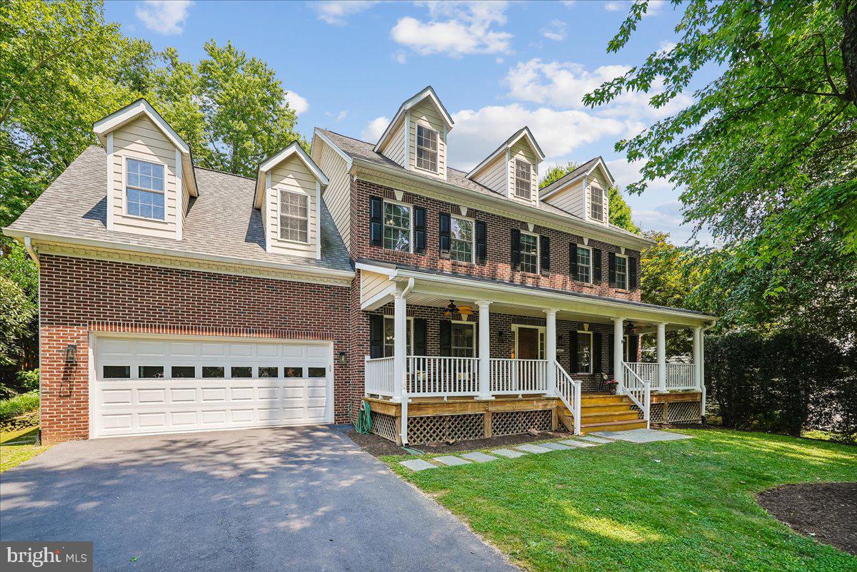 Custom built in 2006 and ideally located in the highly sought-after Franklin Park neighborhood, this exceptional four-bedroom, 4.5-bath home offers the perfect blend of comfort, style, and convenience.
A welcoming front porch invites you to relax, greet neighbors, and enjoy the charm of this friendly community. Inside, the flexible main-level living room can also serve as a private home office. The spacious open-concept family room features a cozy wood-burning fireplace and French doors that lead to a large rear deck, creating seamless indoor-outdoor living.
Designed for both everyday living and entertaining, the backyard offers a generous deck, mature trees providing a lush green backdrop, and a fully fenced yard. The well-appointed kitchen boasts a large center island, cooktop, double wall ovens, hardwood floors, and abundant workspace. A separate formal dining room is ideal for hosting family and friends.
On the upper level, you'll find a  luxurious ensuite primary bedroom with vaulted ceilings, a second ensuite bonus room, along with two additional generously sized bedrooms, a spacious hall bath, and a convenient separate laundry room.
The fully finished walk-up lower level expands the living space with a large recreation room featuring a gas fireplace, a full bath, extensive storage, and direct access to the backyard.
Additional highlights include an oversized two-car garage with ample storage space.
Enjoy an unbeatable location at the end of a quiet cul-de-sac. Walk to Chesterbrook Elementary School, with bus service to Longfellow Middle School and McLean High School just at the top of the street. Commuting is easy with quick access to Metro, Metrobus, Tysons, the George Washington Parkway, I-495, and I-66. You'll also be just minutes from the restaurants, coffee shops, and shopping in downtown McLean.
This is a wonderful opportunity to own a beautifully designed home in one of the area's most desirable neighborhoods. Come see all it has to offer!