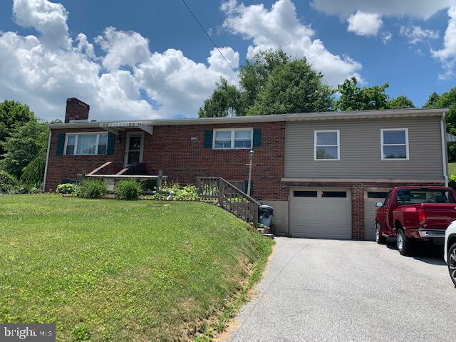 Country ranch in great condition.  Hardwood floors, fireplaces, remodeled kitchen and large family room.  Covered patio, above ground pool and open air living.  2 car garage.