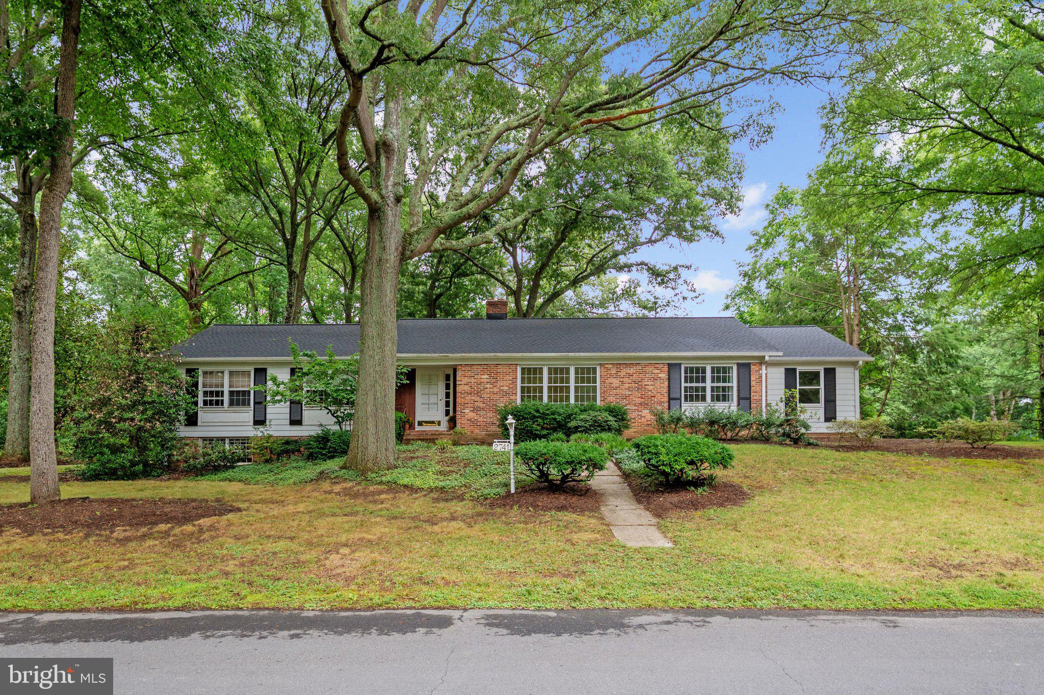 GINGERVILLE! Situated on a spacious 1/2 acre corner lot in the highly sought-after Gingerville Manor Estates community, this charming 3-bedroom, 2.5-bath rancher offers endless potential and is ready for its next owners to make it their own. Surrounded by mature trees and located on a quiet, established street, this home provides the perfect blend of comfort, space, and opportunity.  Inside, you'll find generously sized bedrooms, a newer roof, and a thoughtful layout designed for both everyday living and entertaining. The heart of the home features an open kitchen that flows seamlessly into a cozy family room complete with a wood-burning fireplace—perfect for gathering on cool evenings. Additional living and dining spaces offer flexibility for hosting guests, working from home, or simply spreading out and enjoying the home's versatile floor plan.  Conveniently located just off the kitchen, the one-car garage and laundry area provide practical functionality for busy households. The walkout lower level expands the living space even further, offering a large recreation area ideal for a playroom, teen hangout, home gym, or media room. An expansive unfinished section provides abundant storage or the opportunity to create additional finished living space tailored to your needs and vision.  Life in Gingerville is about more than just the home—it's about community. Residents enjoy some of the area's most desirable amenities, including a community pool, pavilion, basketball court, baseball field, and scenic pond. Throughout the year, neighbors come together for a variety of community events, creating a welcoming and connected atmosphere that makes Gingerville such a special place to call home. This home offers easy access to shopping, dining, and entertainment at Annapolis Towne Centre, as well as the charm and waterfront attractions of Downtown Annapolis. Commuters will appreciate the convenient access to Baltimore, Washington, D.C., and surrounding areas by both car and commuter bus.  A rare opportunity to own in one of the area's most beloved neighborhoods.  Come make this your new home!  **New roof 2024** Estate sale, property being sold AS-IS.