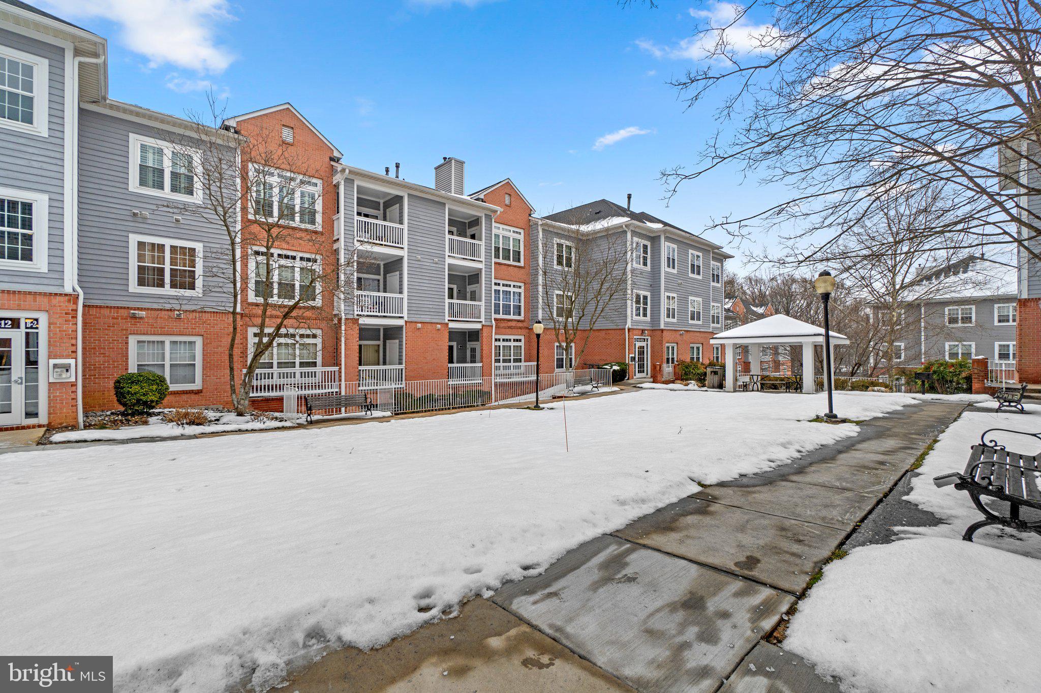 2 bedroom 2 Bath Condominium at Spring Mill community. Main level close to the main entry door. Spring Mills offers secure entry buildings and has secured gated parking garage in the lower level and elevator service. The condo has a modern kitchen with plenty of counter space and cabinets. Also includes a stackable washer and dryer in the kitchen closet. The HVAC system was upgraded in 2018. The Spring Mill Condominium community's includes swimming pool, community center, tennis courts, courtyards with grills, car wash are and picnic area.