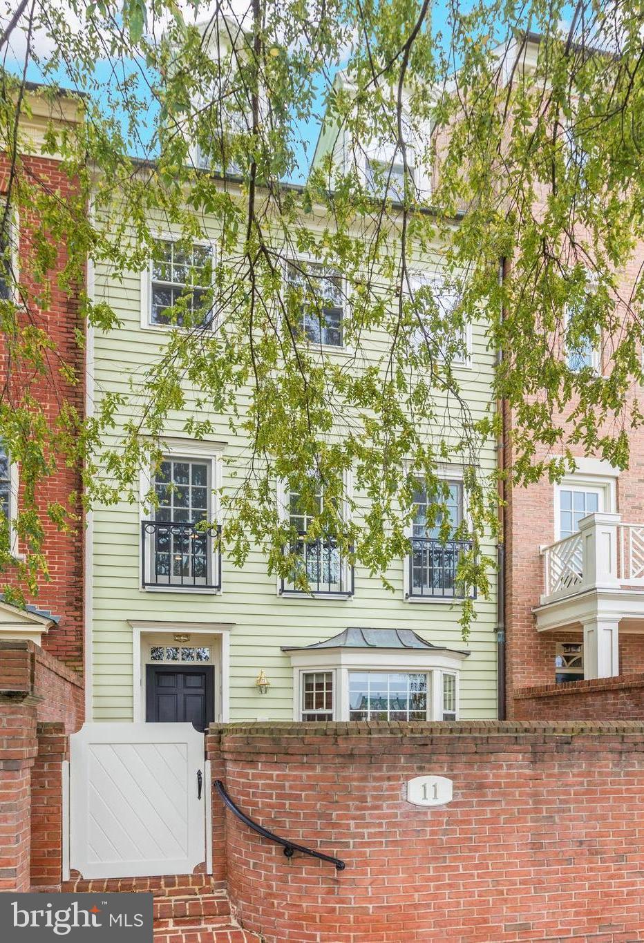 Exceptional Harborside townhouse in the Southeast quadrant of Old Town overlooking the Potomac River!  This fabulous  3 BR 3.5 bath home offers high ceilings, deep moldings, 2 fireplaces, a wet bar and an interior elevator.  Sleek new Lobkovich Chef's kitchen with desirable Lacanche French stove, quartz countertops with sea glass, sleek frameless custom cabinets with a birch wood stain is adjacent to the sunny family room with tall glass doors providing  spectacular waterfront vistas.  The spacious master suite offers 3 windows looking at the glistening river, a walk-in California Closet, and oversized marble master bath.  A bright, generous  guest room currently used as an office, offers natural light,  water views, hardwood floors, plus an en-suite bath.  And the top floor features a private guest suite complete with a sitting room, handsome built-in bookshelves, skylights and a full bath.  Enjoy a  glass of wine on your private brick patio just steps away from the living room wet bar.  Two car garage parking completes this pristine home.  Please note:  square footage of this property is 2,832.  The Alexandria tax records are incorrect.  Please follow CDC guidelines with everyone wearing masks when touring this home.