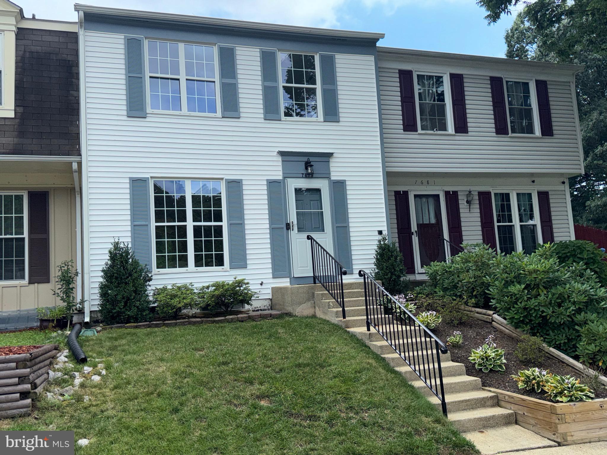 Impeccably remodeled and move-in ready, this beautiful three-level townhome backs to a peaceful wooded common area, offering both privacy and a serene setting. Ideally located just minutes from the Lorton VRE Station and the gates of Fort Belvoir, this home combines comfort with exceptional convenience.
The main level features brand-new solid hardwood flooring, complemented by hardwood staircases that add warmth and elegance throughout. The remodeled kitchen showcases rich cherry cabinetry, sparkling granite countertops, a breakfast bar, and a built-in pantry, making it both stylish and functional.
Upstairs, you'll find fresh plush carpeting throughout the bedroom level, along with a spacious primary suite featuring a ceiling fan and custom closet organizers. The full bathroom has been completely renovated with modern finishes.
The walkout lower level has been beautifully refinished with bright LED recessed lighting and luxury vinyl plank flooring,  offering a spacious recreation room, a remodeled full bathroom, and a versatile bonus room that can serve as a home office, fitness room, or guest space that functions like a fourth bedroom.
Outdoor living is equally inviting with a refurbished deck featuring all-new decking and handrails, accessible through an updated sliding glass door from the dining room. The fully fenced backyard includes a stone patio and grassy lawn, perfect for relaxing or entertaining.
Major recent improvements include the roof, siding, and HVAC system (2019). Community amenities, including tennis courts and a tot lot, are just a short stroll away.