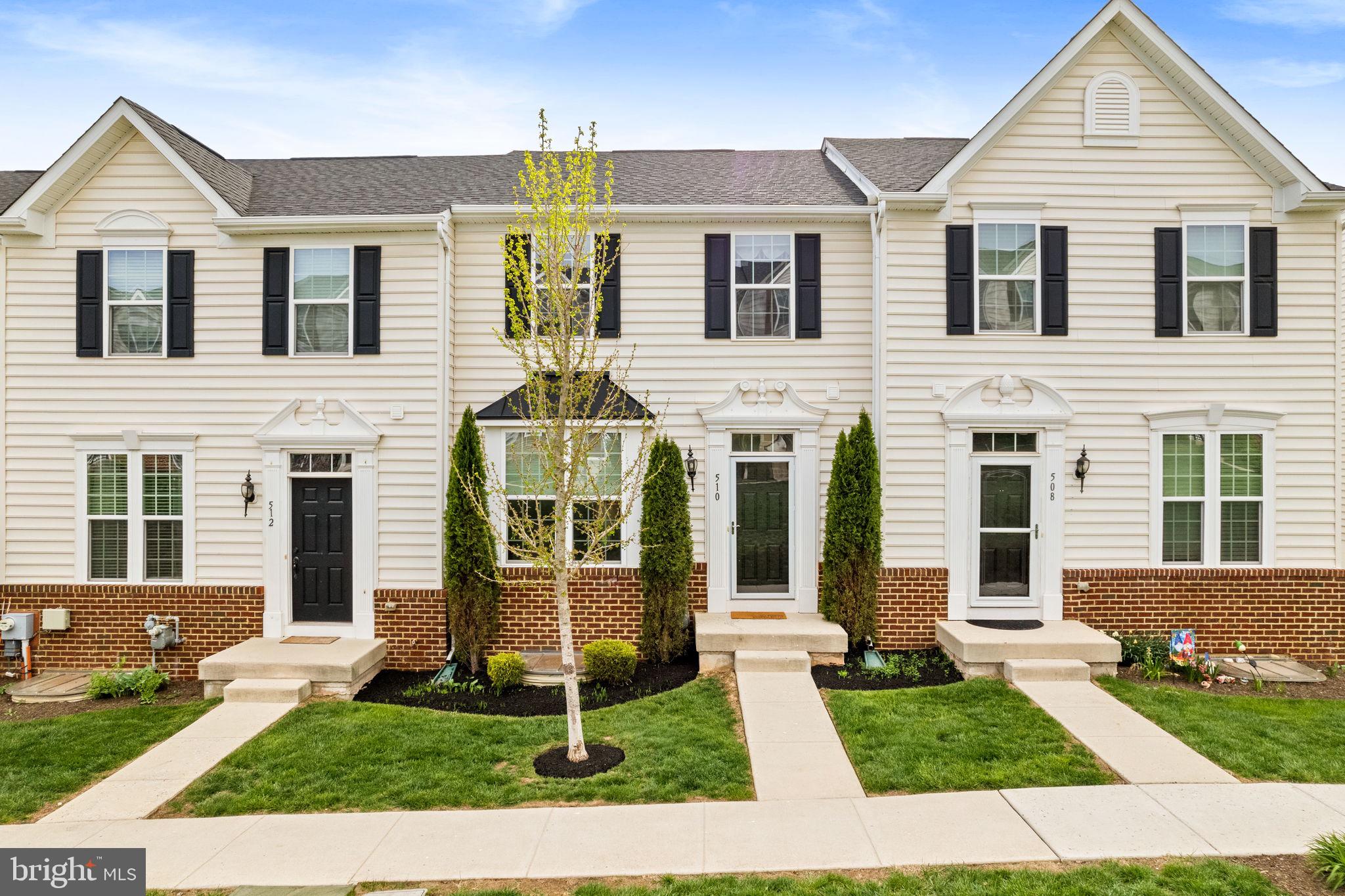 Welcome to a home that blends everyday ease with vibrant community living. Enjoy the convenience of rare main-level entry and the charm of a lively courtyard—where neighbors come together for movie nights, Easter egg hunts, block parties, and more. It’s more than a view—it’s a front-row seat to connection, laughter, and a true sense of belonging. Inside, you’ll find gorgeous hardwood floors that flow seamlessly throughout the main living space. The spacious, sun-drenched living room leads into a chef-inspired kitchen with granite countertops, a tile backsplash, stainless steel appliances, a large pantry, and an oversized center island—perfect for casual breakfasts or entertaining guests. Just off the kitchen, the large dining area and sitting room feel bright and inviting, thanks to the large windows and French doors that open onto a spacious deck complete with a brand-new retractable awning.  A convenient powder room and coat closet round out this level. Upstairs, the primary suite is your personal retreat, complete with a spa-like ensuite bath featuring a dual vanity, walk-in shower, and a soaking tub. Two additional bedrooms, a full hall bath, and a convenient upper-level laundry room complete this floor. The finished lower level offers incredible flexibility with a 4th bedroom, full bath, storage space, and access to the 2-car garage. *Bonus savings: this home only requires an HO-6 policy (similar to renter's insurance), which can significantly lower both your closing costs and monthly mortgage payments compared to other townhomes. All of this, just walking distance to Bridge Street, steps from the Schuylkill River Trail, and minutes from major routes (23, 29, 113, and 422). This is the low-maintenance lifestyle you’ve been looking for—set in a neighborhood that feels like home.