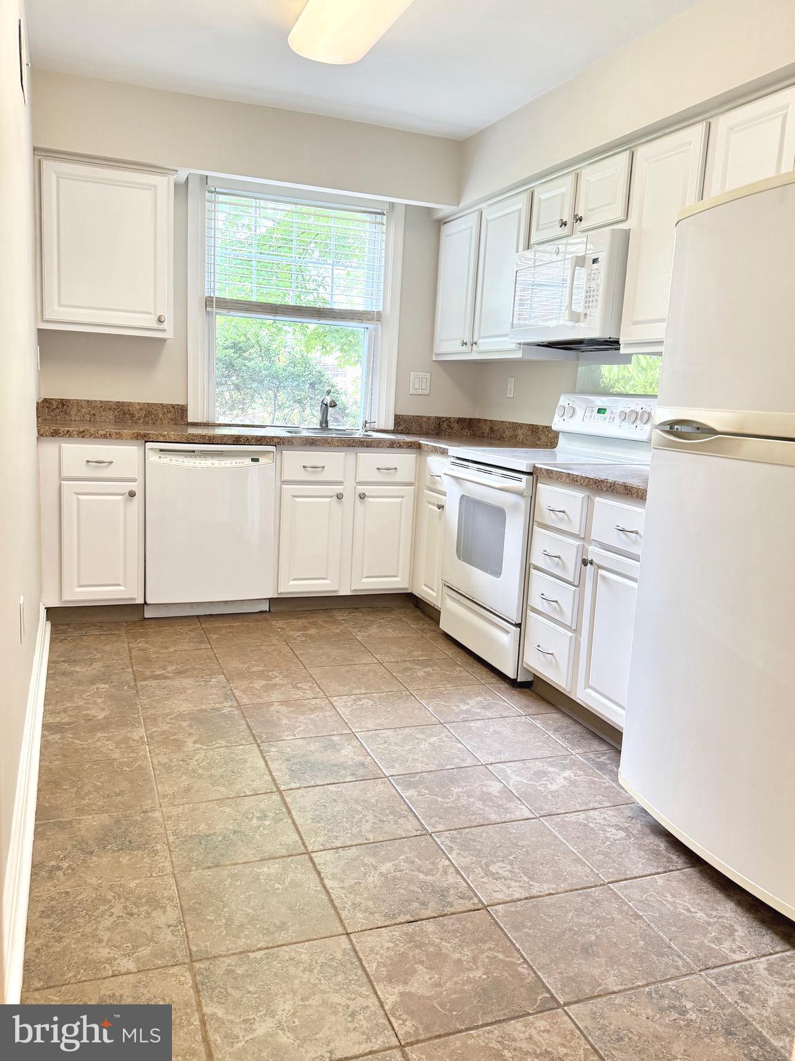Prime Location in St. Davids Park Condominiums!
Easy, bright and airy first-floor-unit, perfectly situated within the desirable St. Davids Park Community. This meticulously maintained and freshly painted 2-bedroom, 1-bathroom condo welcomes you with beautiful hardwood floors, arched doorways and a generous sized living room.  There is a huge, private bonus room located in the building which houses the washer and dryer. Some use it for storage, others a gym, use your creativity! This unit also comes with deeded parking in the garage at no additional cost. There is no gas in the building and water is covered in the HOA, your only utility is electricity and WiFi! Live in the center of all Wayne has to offer, skip to the commuter rail in minutes, grocery stores, restaurants and shops!