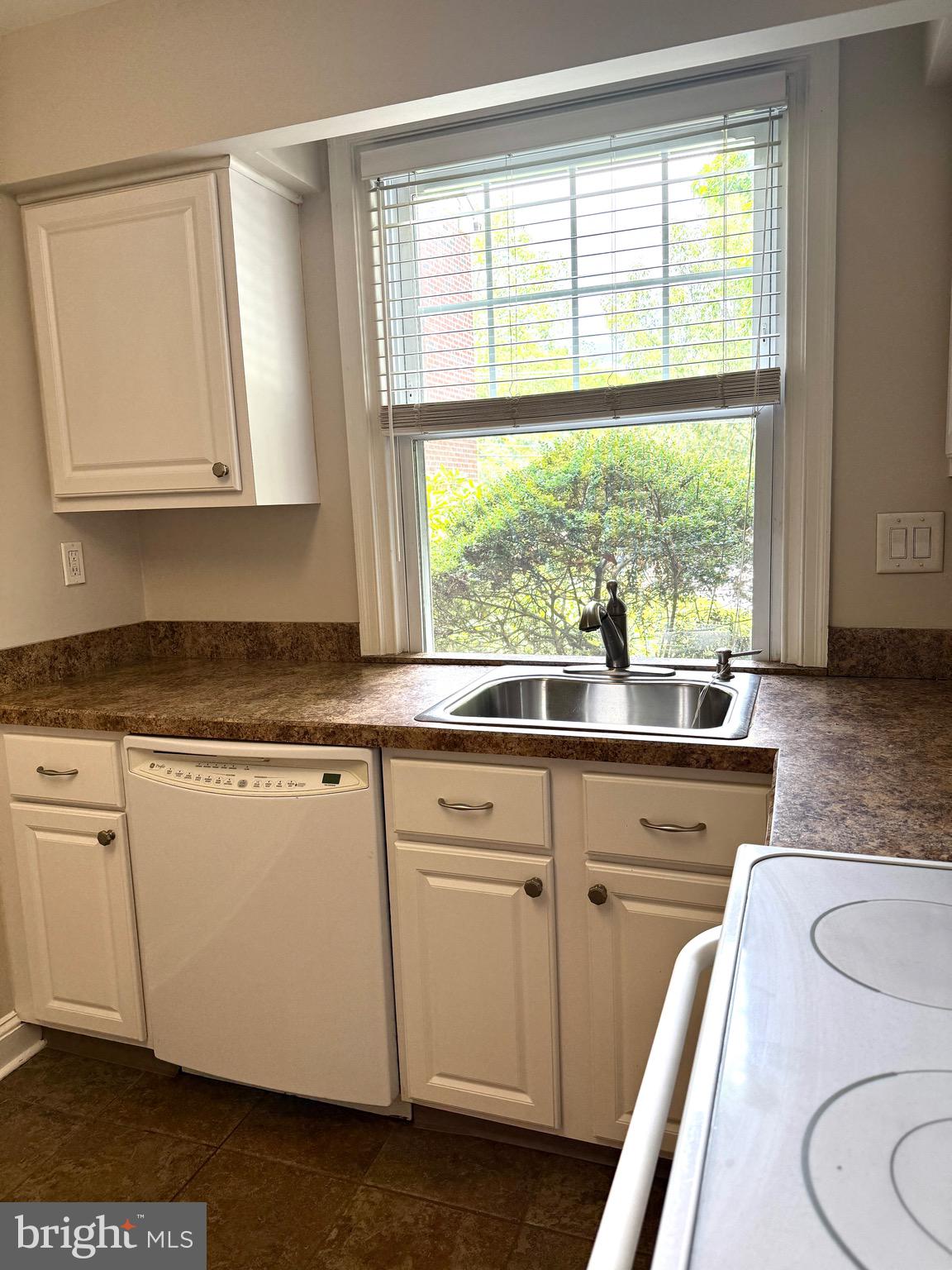 Prime Location in St. Davids Park Condominiums!
Easy, bright and airy first-floor-unit, perfectly situated within the desirable St. Davids Park Community. This meticulously maintained and freshly painted 2-bedroom, 1-bathroom condo welcomes you with beautiful hardwood floors, arched doorways and a generous sized living room.  There is a huge, private bonus room located in the building which houses the washer and dryer. Some use it for storage, others a gym, use your creativity! This unit also comes with deeded parking in the garage at no additional cost. There is no gas in the building and water is covered in the HOA, your only utility is electricity and WiFi! Live in the center of all Wayne has to offer, skip to the commuter rail in minutes, grocery stores, restaurants and shops!