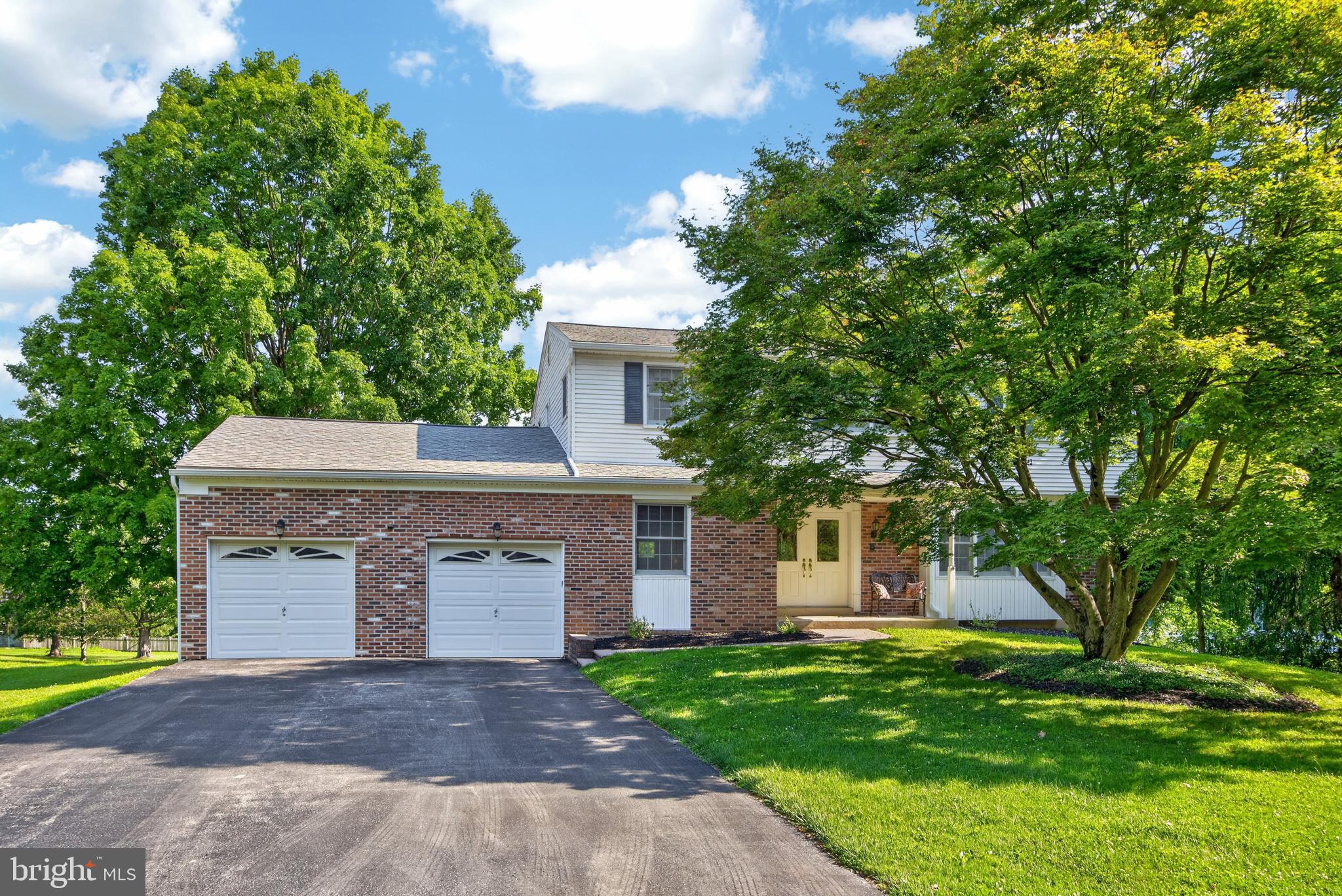 Welcome to this spacious 4-bedroom, 2.5-bath colonial situated on a level .61-acre cul-de-sac lot in the established Marchwood community. Offering 2,388 square feet, this brick and vinyl home features great curb appeal, an oversized 2-car garage, and screened-in deck overlooking the expansive backyard.
The main level includes a spacious living room, formal dining room, updated kitchen with Corian countertops, center island, appliance garage, GE Monogram stainless steel refrigerator, GE Profile wall oven, and Andersen sliding door leading to the screened-in deck. The adjoining family room features a propane fireplace with blower and a walk-in closet, while the convenient first-floor laundry room provides direct access to the backyard. The powder room and entrance to the oversized 2 car garage complete this level. Upstairs, the primary suite offers a private bath, while three additional generously sized bedrooms with large closets share a hall bath. Pull-down stairs to the attic add additional storage space. The basement is unfinished and features a French drain system with transferrable warranty and an exit to the side yard. Additional amenities include hardwood floors throughout most of the home, central air,  many updated windows, updated exterior doors, a Generac whole-house generator, and 200-amp electrical service. Marchwood is one of Exton's most popular communities, known for its neighborhood feel, spacious homes, and outstanding location. Offering the space so many buyers are looking for and the opportunity to make it your own, this competitively priced property is an exceptional value for buyers seeking nearly 2,400 square feet of living space on a level, .61-acre cul-de-sac lot—all within the award-winning Downingtown East School District and nationally recognized STEM Academy. This is an estate sale and home is being sold in 'as-is' condition.