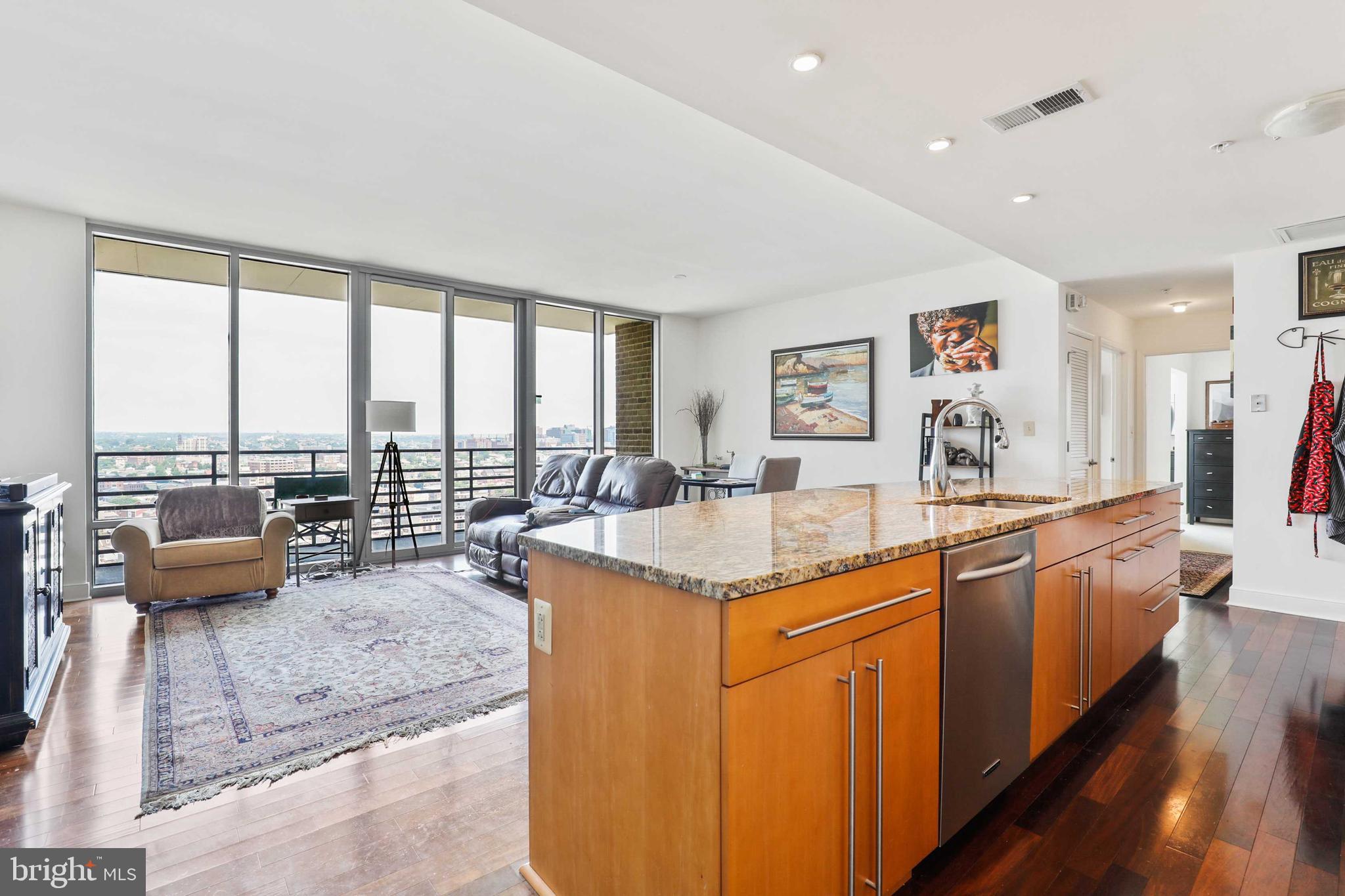 Fabulous Harbor East two bedroom, two bath condo in The Vue! This sun filled unit sits on the 21st floor and offers gorgeous city views. Gourmet kitchen with granite counters, oversized island and stainless steel appliances. Hardwood floors, Balcony off living room.  Primary bedroom with spacious en suite bath with tub and walk-in shower, double vanity, walk-in closet and water view. One assigned parking space included with this property. Walk to Baltimore's best restaurants, shopping and night life!
