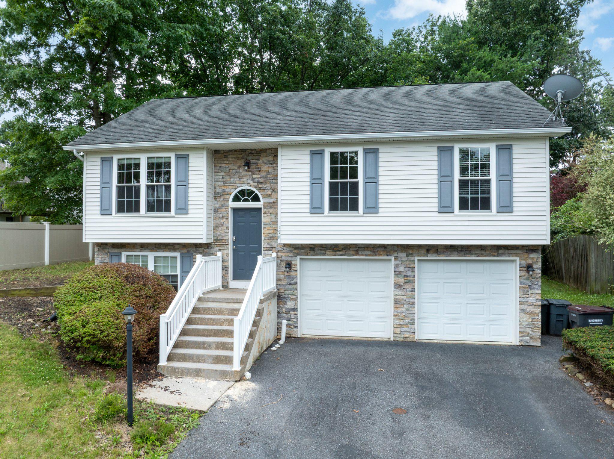 Discover the charm of this delightful split-level home nestled on McKivison Court! Built in 2007, this inviting residence features 4 spacious bedrooms and 2 full bathrooms, perfect for both relaxation and entertaining. The warm hardwood floors guide you through the open layout, leading to a cozy living area that seamlessly connects to a well-appointed kitchen. Step outside to your private deck, ideal for morning coffee. The partially finished basement offers endless possibilities-create a game room, home gym, or additional storage space. With an attached 2-car garage and off-street parking, convenience is at your fingertips. Set on a manageable 0.15-acre lot, this home balances comfort and functionality. Enjoy the peaceful surroundings while being just a short drive from local amenities. Don't miss your chance to make it your own!