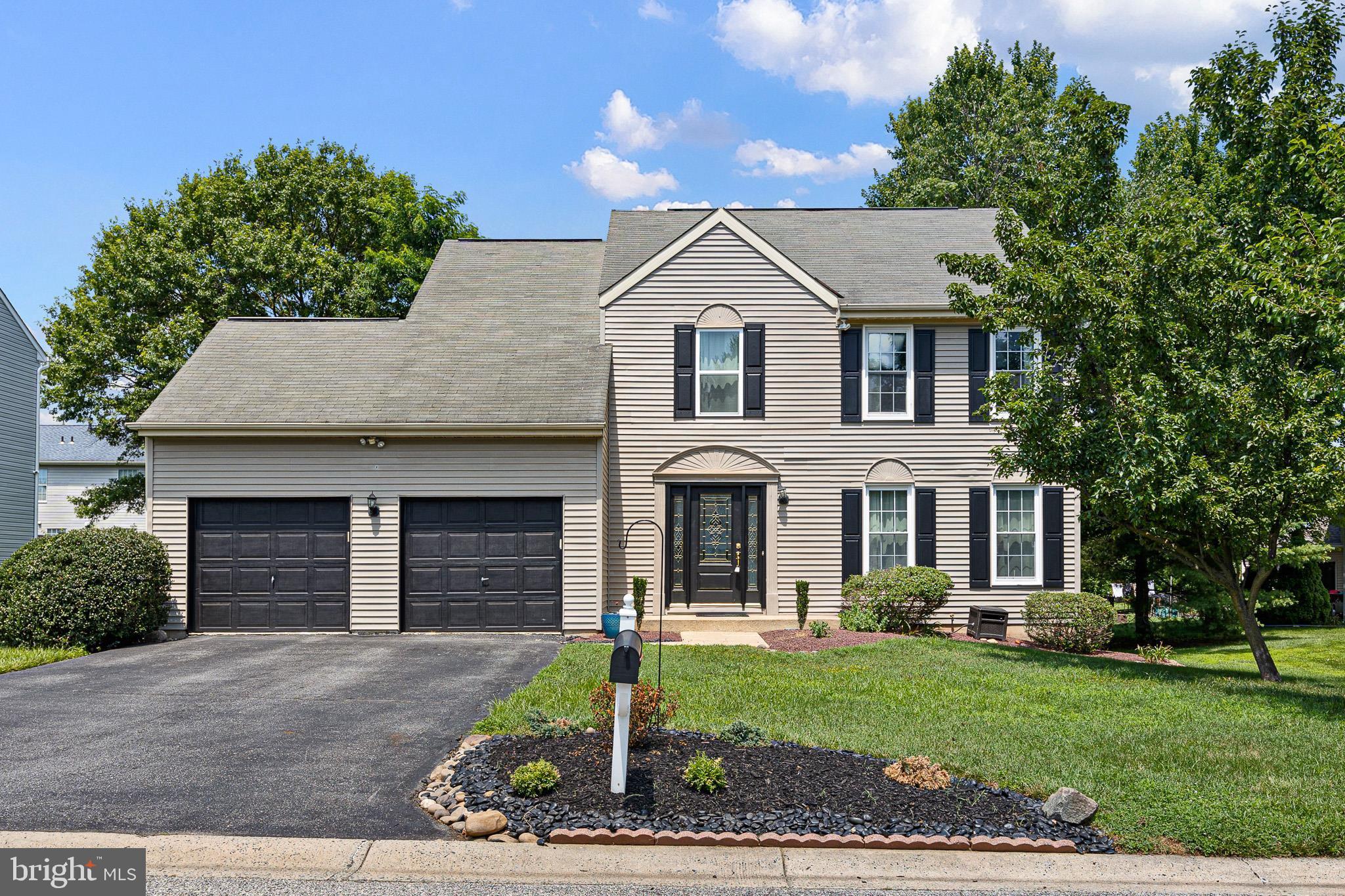 Looking for your first single family home with space to grow, entertain, and make your own? This spacious 4-bedroom, 2.5-bath former Handler model offers the perfect blend of comfort, character, and opportunity, all set on a beautifully landscaped lot with a two car garage.

Step inside to a welcoming hardwood foyer and a flexible floor plan designed for everyday living. The formal dining room, featuring Bruce hardwood flooring and as ready for holidays, dinner parties, or casual gatherings with friends. A separate study/living room with hardwood floors, custom moldings, ceiling fan, and French doors makes a great home office, gaming room, reading space, or cozy retreat.

The spacious kitchen with breakfast area offers plenty of function with tile flooring, a peninsula, pantry, dishwasher, smooth top convection stove, built in microwave, and convenient main floor laundry. While some finishes reflect the home’s original style, the layout gives you an incredible canvas to personalize over time and add your own modern touches.

The kitchen opens to a bright family room with cathedral ceiling, skylights, fireplace, and dual French doors leading to the custom 25' x 15.5' deck, ideal for summer cookouts, morning coffee, or relaxing after work. Upstairs, the primary suite features a vaulted ceiling, walk-in closet, and large private bath with shower, garden tub, and skylight. The finished lower level adds even more flexibility with a media/exercise room and extra storage.

With generous living space, classic details, lovely landscaping, and room to update at your own pace, this is a wonderful opportunity to move into a single-family home and start building your next chapter.