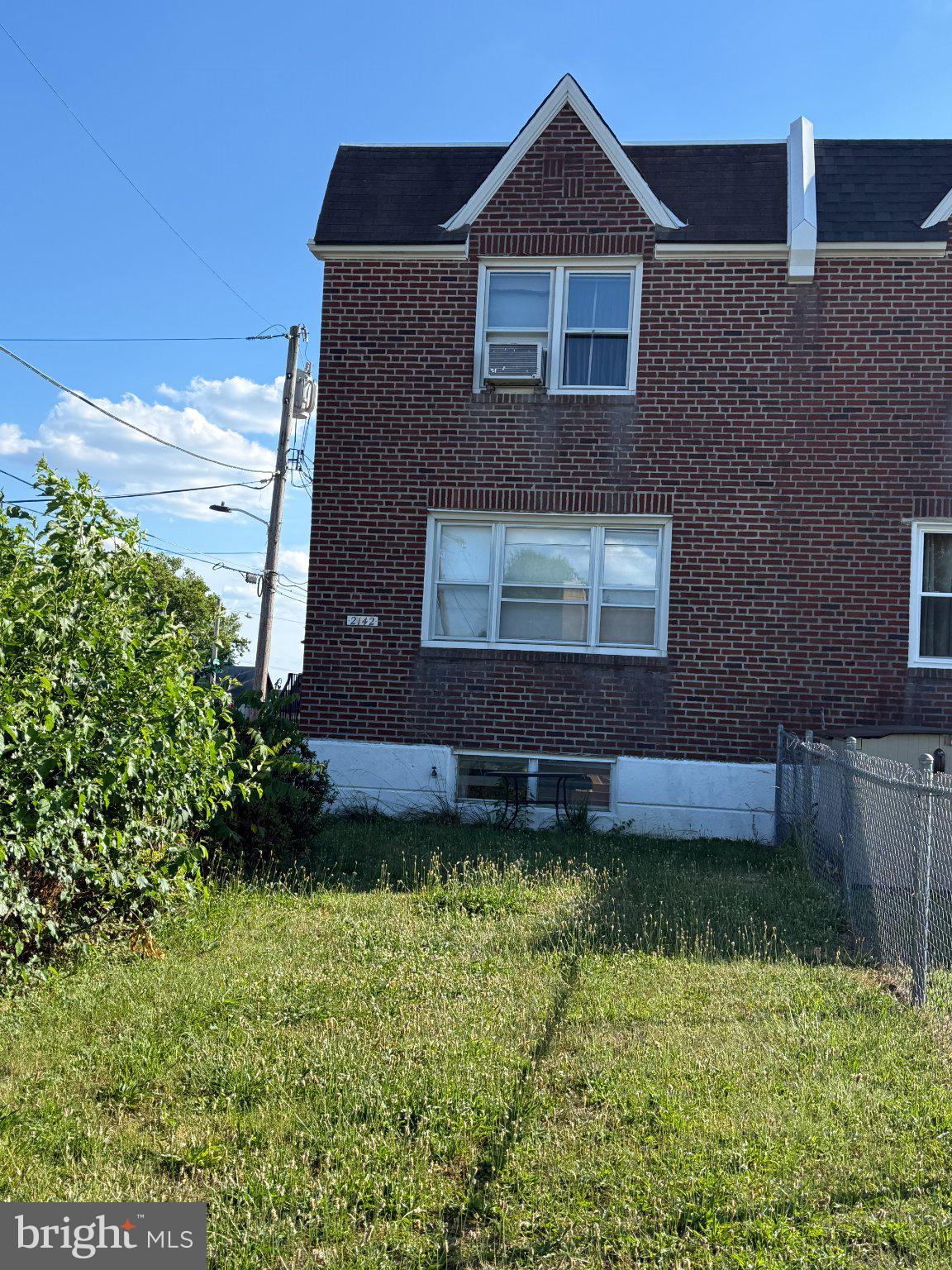 This bright and roomy twin sits on a desirable corner lot in the heart of Rhawnhurst, offering extended front lawns and a peaceful setting on an exceptionally quiet block. The original hardwood floors have been exposed after carpet removal. The home has been well‑lived‑in by a long‑term tenant and is ready for updating, making it an excellent opportunity for buyers looking to customize or invest. The layout is generous, the natural light is abundant, and the location is hard to beat. Conveniently close to a wide variety of shopping, dining, and transportation options, with easy access to Rhawn Street, Bustleton Avenue, and Roosevelt Boulevard, this property offers both comfort and connectivity.