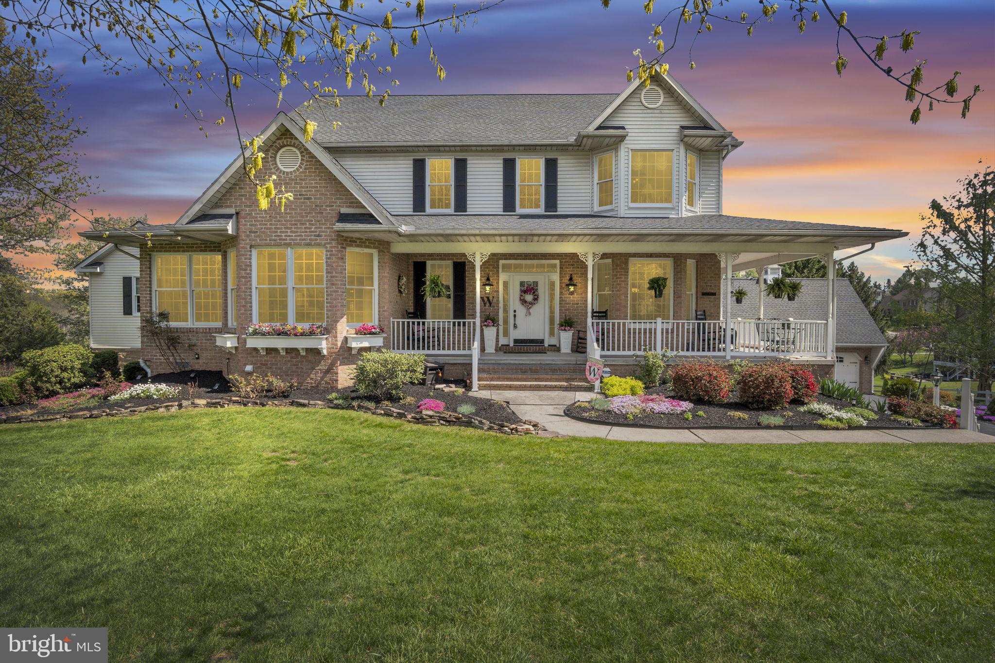 ******Open house Sunday, May 31 1:00-3:00*****
Welcome to one of York County’s truly one-of-a-kind homes—an immaculate 6-bedroom, 5.5-bath estate offering over 6,000 sq ft of exceptional living space, meticulously updated and lovingly maintained by the same owners for almost two decades. Set at the end of a private cul-de-sac on over 2 acres, this residence is magazine-worthy from the moment you arrive, and that impression only deepens once you step inside and experience the owners’ incredible décor and attention to detail. The heart of the home is the expansive chef’s kitchen featuring dual islands, custom cabinetry, granite countertops, a professional-grade Viking gas cooktop, and updated appliances (2022–2024). The main level flows effortlessly through multiple warm and inviting gathering spaces—including a stunning family room with panoramic windows, formal dining, cozy sitting areas, and a four-season sunroom addition—each showcasing the pride, craftsmanship, and love poured into this home. With four fireplaces, rich millwork, new luxury flooring (2023), and abundant natural light, every room radiates both comfort and elegance.
The lower level offers an exceptional in-law quarters complete with a full kitchen, bedroom, private bath, dedicated laundry, and a private entrance—an ideal setup for long-term guests or multigenerational living. Two main-level bedroom suites further enhance the home’s rare flexibility.
Outdoors, the professionally designed patios, outdoor fireplace, and lush landscaping create a serene retreat ideal for entertaining or relaxing. And wait until you see this property in the spring—the vibrant pops of color, layered perennial gardens, and mature blooms make the home look straight out of a Home & Garden magazine. (Previous seasonal photos have been provided so buyers can fully appreciate just how spectacular the grounds look in the spring and summer months.)
For car lovers, hobbyists, or anyone needing exceptional storage, this property also includes an attached garage plus a stunning detached garage that can accommodate up to six vehicles—a rare and valuable feature in any estate-style home.
Major improvements include a new roof (2021), furnace/central air (2021), updated baths, new appliances, and extensive interior enhancements totaling over $200k. A breathtaking, impeccably cared-for property that any buyer would be proud to call home