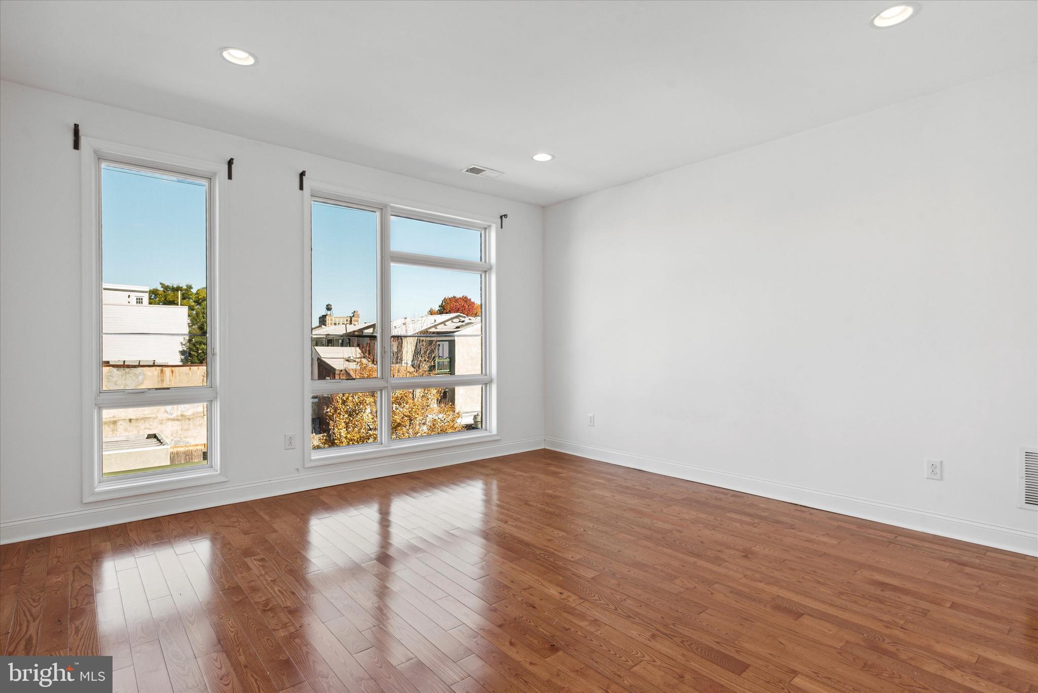 Welcome to 310 Cecil B. Moore Ave, a stunning 4-bedroom, 3-bathroom single-family home offering modern elegance and timeless charm in an attached row house style. Spanning approximately 2,300 square feet across 11 thoughtfully designed rooms, this residence is perfect for those seeking both comfort and functionality.

As you step inside, recessed lighting illuminates the open and inviting layout, showcasing the heart of the home: an extraordinary kitchen. Complete with stainless steel appliances, a gas stove and oven, granite countertops, a spacious island, and a convenient butler's pantry, this kitchen is a dream for cooking enthusiasts and entertainers alike. Additional highlights include an open kitchen design, refrigerator, range, and dishwasher for seamless meal prep and cleanup.

The generously sized primary suite features an ensuite bathroom, offering a peaceful retreat after a long day. Step outdoors to enjoy your private patio or ascend to the roof deck, where you'll appreciate the extra outdoor space for relaxation or entertaining. The full basement provides ample space for additional storage or future customization to suit your lifestyle.

This home is complete with central air conditioning for year-round comfort and includes the added convenience of in-unit laundry with a washer and dryer.

Situated in a prime Philadelphia location, this property combines modern amenities with classic row house charm. Don’t miss the opportunity to call this incredible property your home! Schedule your private tour today to experience it for yourself.
