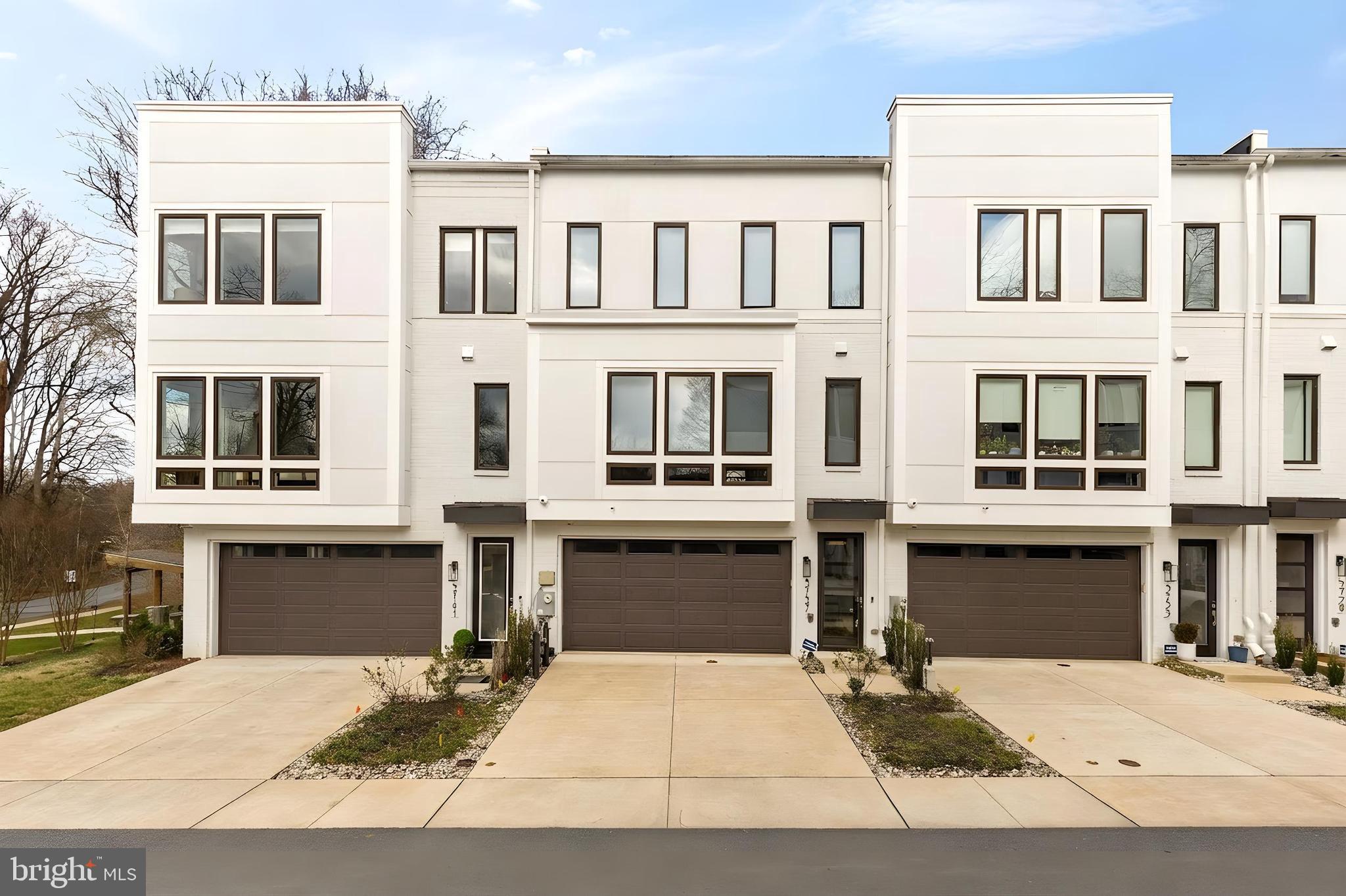 Located within the desirable Creekside Chevy Chase community, this beautifully appointed 4-bedroom, 3.5-bath residence with an elevator blends modern design with comfortable everyday living. Wide-plank hardwood floors, high ceilings, and expansive windows fill the home with natural light, creating bright and inviting living spaces throughout.

The thoughtfully designed layout offers generous living areas and a well-balanced bedroom configuration. The upper level is highlighted by the spacious primary suite, complete with two walk-in closets and a well-appointed bath featuring dual vanities and a large glass-enclosed shower, along with two additional bedrooms that share a hallway bath. The lower level includes a fourth bedroom, providing flexible space for guests, a private office, or additional living needs.

One of the home’s most exceptional features is its peaceful setting overlooking Rock Creek Park. With protected parkland beyond, the serene wooded views are here to stay, offering a rare sense of privacy and connection to nature. Outdoor living is equally impressive, with a patio designed for entertaining and relaxation featuring a full-length electric awning, wet bar, and outdoor refrigerator. A screened porch and enclosed outdoor turf area further extend the living space, creating a private setting to unwind, entertain, or simply enjoy the surrounding greenery.

Combining stylish interiors, flexible living spaces, and a tranquil park-side backdrop, this home presents a rare opportunity in one of Chevy Chase’s most sought-after communities.