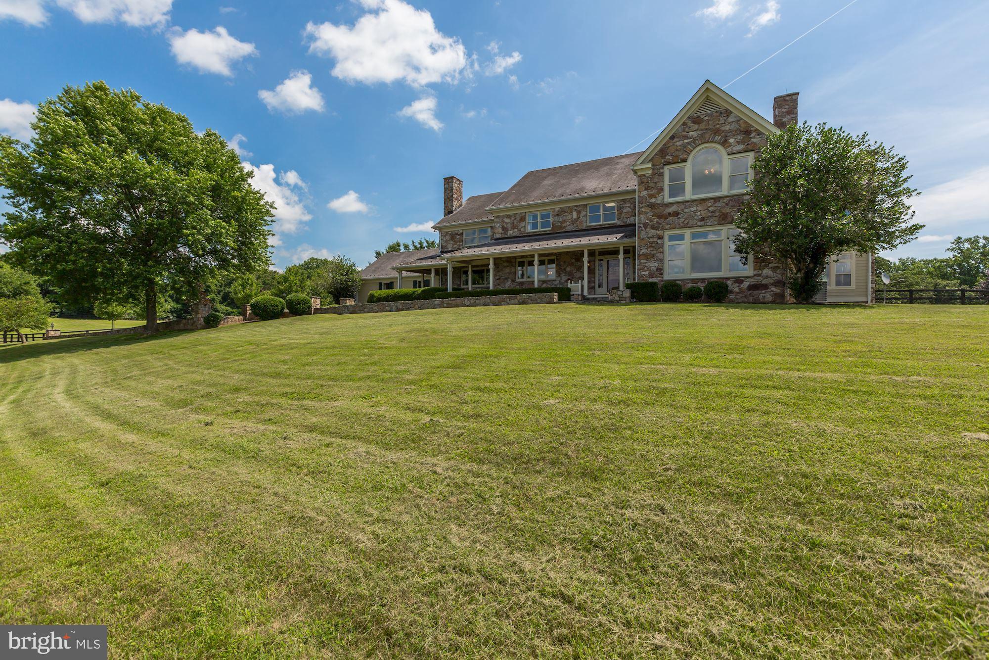 Welcome to 20544 Beaverdam Bridge Rd. This hidden gem a stone's throw from the cozy village of Philomont was custom designed and built by well known local builder as his personal home. The property boasts over 6,000 sf of living space in the main home, huge pool with pool house, and spacious workshop. The 32 acres of rolling pasture perfect for the horse enthusiast or country weekender offer amazing views and privacy. Beautiful architectural features abound in this 5 bedroom, 4.2 bath home featuring a stunning entryway, gourmet kitchen, formal living and dining rooms, and cozy family living space with wood burning fireplace. The well-thought-out floor plan allows for easy flow for entertaining and family gatherings. Enormous basement features two large finished spaces perfect for family entertainment or exercise, plenty of unfinished space for storage, and half bath. Huge workshop has been used to build boats, but could easily be converted into a barn with rough-ins for a second floor apartment. This property has it all and is perfectly situated between Middleburg and Purcellville. You get private country living with the conveniences of town only minutes away!