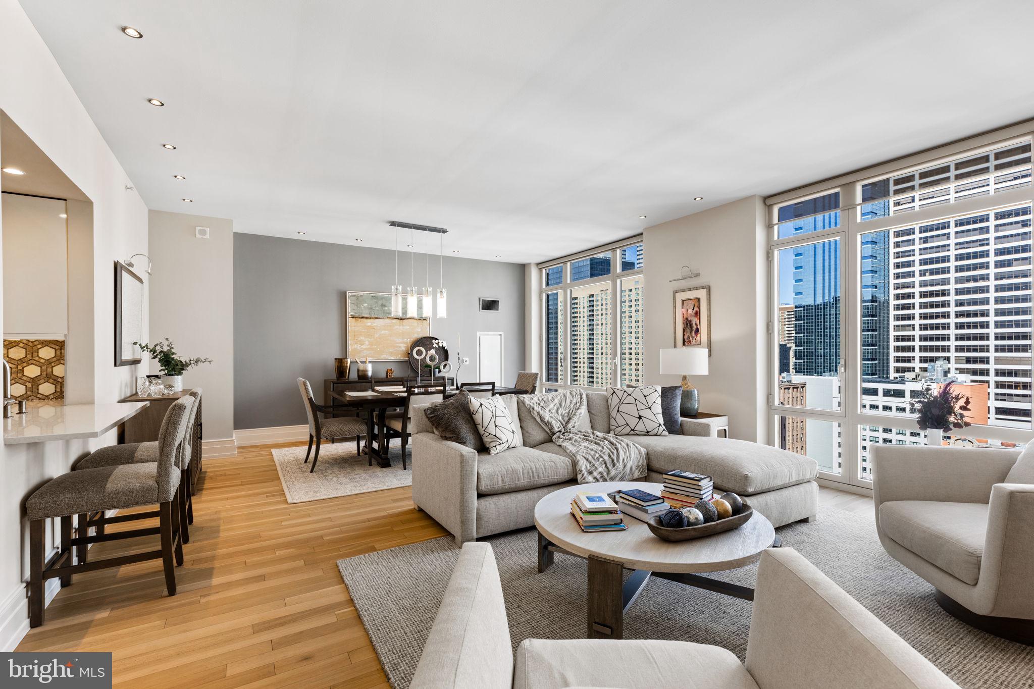 THE ULTIMATE IN LUXURY LIVING AT 10 RITTENHOUSE SQUARE   This expansive two bedroom, two and a half bath residence with ONE CAR PARKING is not to be missed. The living and dining areas feature soaring ceiling heights, gleaming hardwood floors, and floor to ceiling windows offering an abundance of natural light. The chef's kitchen showcases VIKING, MIELE, and SUB-ZERO appliances, an oversized walk-in pantry, and a convenient breakfast bar. The primary bedroom suite boasts ample closet space and a lavish marble bathroom with double sink vanities, a soaking tub and a large glass enclosed shower. The generously proportioned second bedroom includes ample closet space and an en suite bathroom. One car parking, an-on-site storage unit, and sweeping Center City views complete this coveted home. Five Star amenities include a 24-hour concierge, doormen, chauffeur-driven town car service, state-of-the-art fitness center, pool with sauna, and residents lounge with outdoor courtyard. Perfectly situated in Rittenhouse Square, this magnificent residence is steps away from fine dining, one-of-a kind shopping, world-renowned cultural destinations and exciting nightlife.