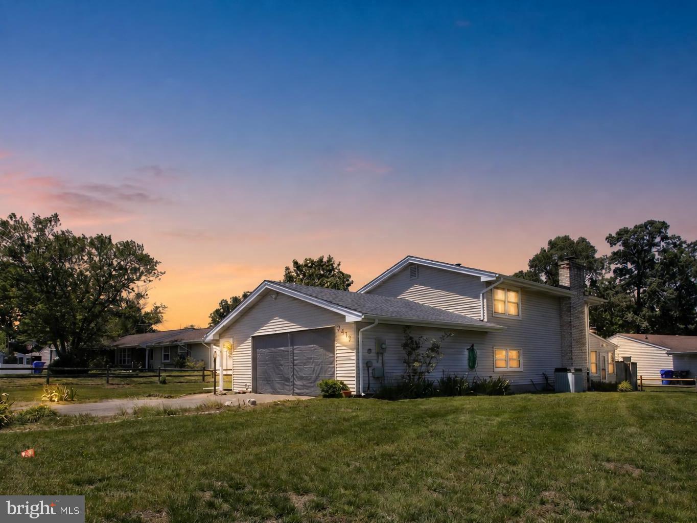 Back on the market and ready for its next buyer! Welcome to 2413 Pinefield Road, a spacious 4-bedroom, 3-full-bath split-level home on a generous corner lot in Waldorf’s established Pinefield community.

Most homes at this price make you choose — space or location, yard or garage, flexibility or privacy. 2413 Pinefield Road gives you all of it.

Located on a generous corner lot in Waldorf’s established Pinefield community, this spacious 4-bedroom, 3-full-bath split-level home offers the room, function, and flexibility today’s buyers are looking for.

The main level features a comfortable living and dining area, along with an eat-in kitchen designed for everyday convenience. The upper level includes three bedrooms, including a private primary suite with its own full bath, plus two additional bedrooms and a full hall bath.

The lower level is where this home truly stands out. A spacious family room with a wood-burning brick fireplace creates the perfect place to relax, gather, and unwind. A private fourth bedroom with an attached full bath offers excellent flexibility for guests, multi-generational living, a home office, or a quiet retreat with real separation from the rest of the home.

A bright sunroom-style bonus space adds even more versatility — ideal for dining, relaxing, entertaining, plants, play space, or simply enjoying natural light throughout the day.

Outside, the corner lot offers room to enjoy, and with no HOA, you have added freedom and flexibility. The attached 2-car garage, driveway parking, public water and sewer, and convenient access to commuter routes, Joint Base Andrews, National Harbor, DC, and surrounding areas make this home as practical as it is inviting.

Space, flexibility, parking, location, and no HOA — this is the kind of home that checks the boxes buyers are tired of compromising on.