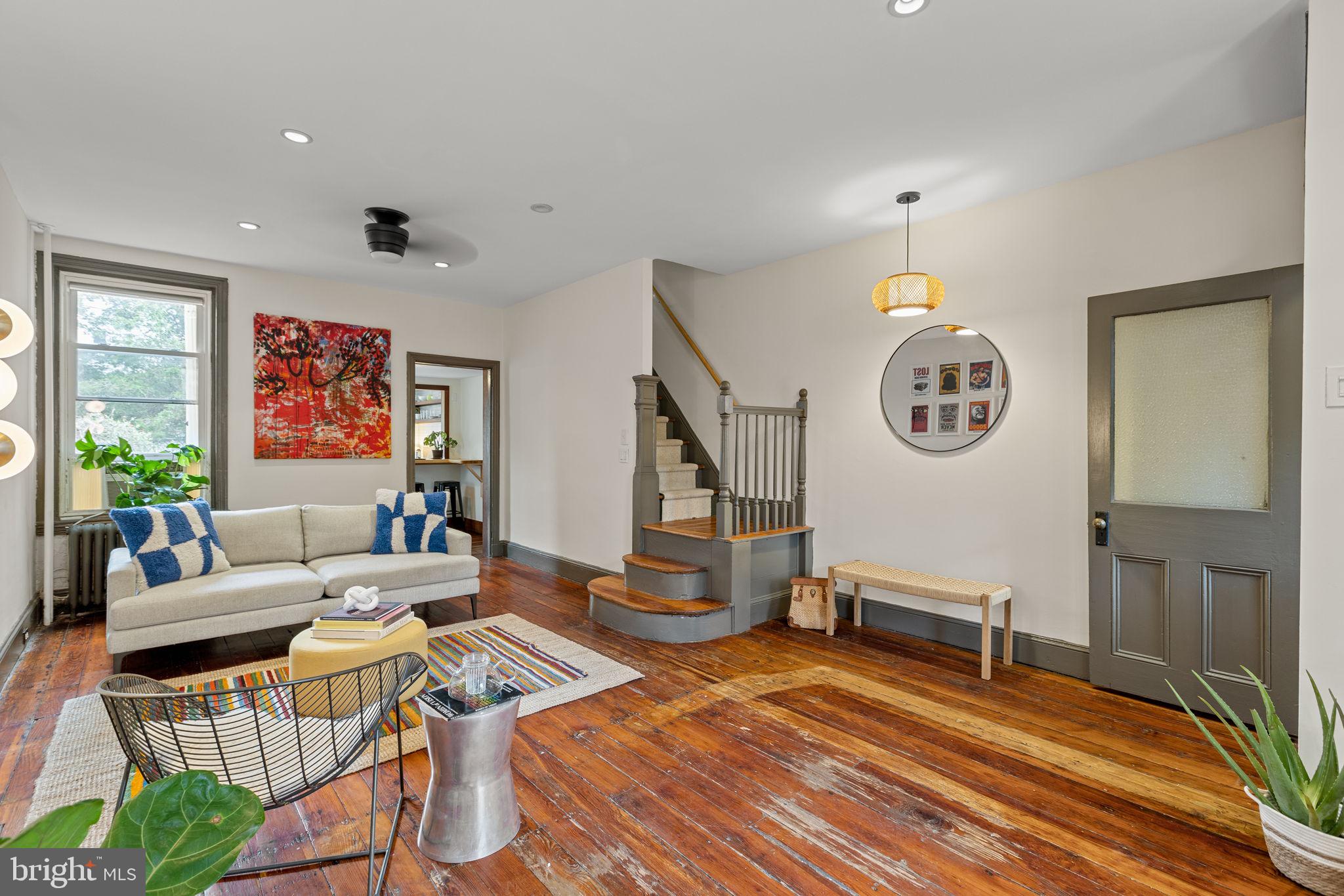 A quintessential Fishtown charmer is here for your delight! This energized 2 bed 1 bath brings you coastal cabin energy while maintaining the Philadelphia historic features that we love. The first floor is larger than it appears, offering two sitting areas within the expanded living area. It features custom built-ins for your collections, a rounded edge staircase, a playful wallpapered vestibule with the original etched glass paneled door, and the original pine floors that continue throughout. Through the living room is the dining space and kitchen, both full of light. The kitchen is airy, featuring open shelving, a breakfast bar, and stainless steel appliances. Take in your view of the whimsical cottage garden through the picture frame window and full-lite door, or find your peace with a cup of coffee on the back patio amongst the plantings!

Upstairs are two bedrooms, both with bright indirect light, and an updated hall full bath with a tub. The primary is nicely sized and easily fits a king bed. The original pine floors continue on the second floor. 

This home is on one of Fishtown’s most coveted blocks and in the Hackett school catchment - 2161 E Letterly is near everything you want to be near: Picnic, Philadelphia Brewing Company, Thunderbird Salvage, OG pizza, endless coffee shops, York dauphin stop, and all the other wonderful local businesses Fishtown has to offer. It is also centrally located to public transit and 95. 

Make sure to read “Aged Exhorter Falls Lifeless as Sermon Ends” in the photos, the article is about a previous owner from 1912! Homes with this much charm and character don’t come around often. Join us for an open house or make your appointment today.
