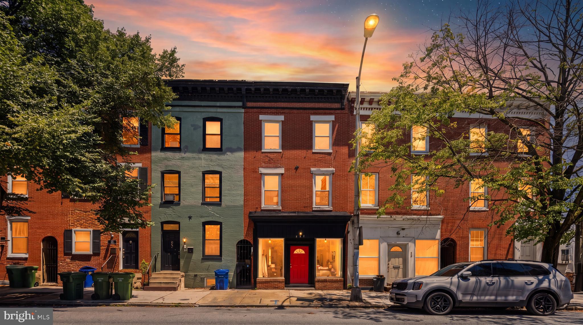 4 large bedrooms? Check! 2-3 car parking pad? Check! Deck? Check! The part you will REALLY love? This home is 100% updated and move-in ready. Welcome to your rarely available, 16’ wide home (most in Federal Hill are 12-13’), full of natural light and historic details like original hardwoods and wood staircases. You’ll appreciate the walk-in closets and tons of square footage - great for a home office, roommates paying your mortgage, or room for the entire family to sprawl out. The owner invested tens of thousands into fresh, neutral paint for the entire home, a new kitchen backsplash, stylish white cabinetry, light fixtures and so much more - all you have to do is enjoy. Easy access to Cross Street Market, the stadiums, and I-95.