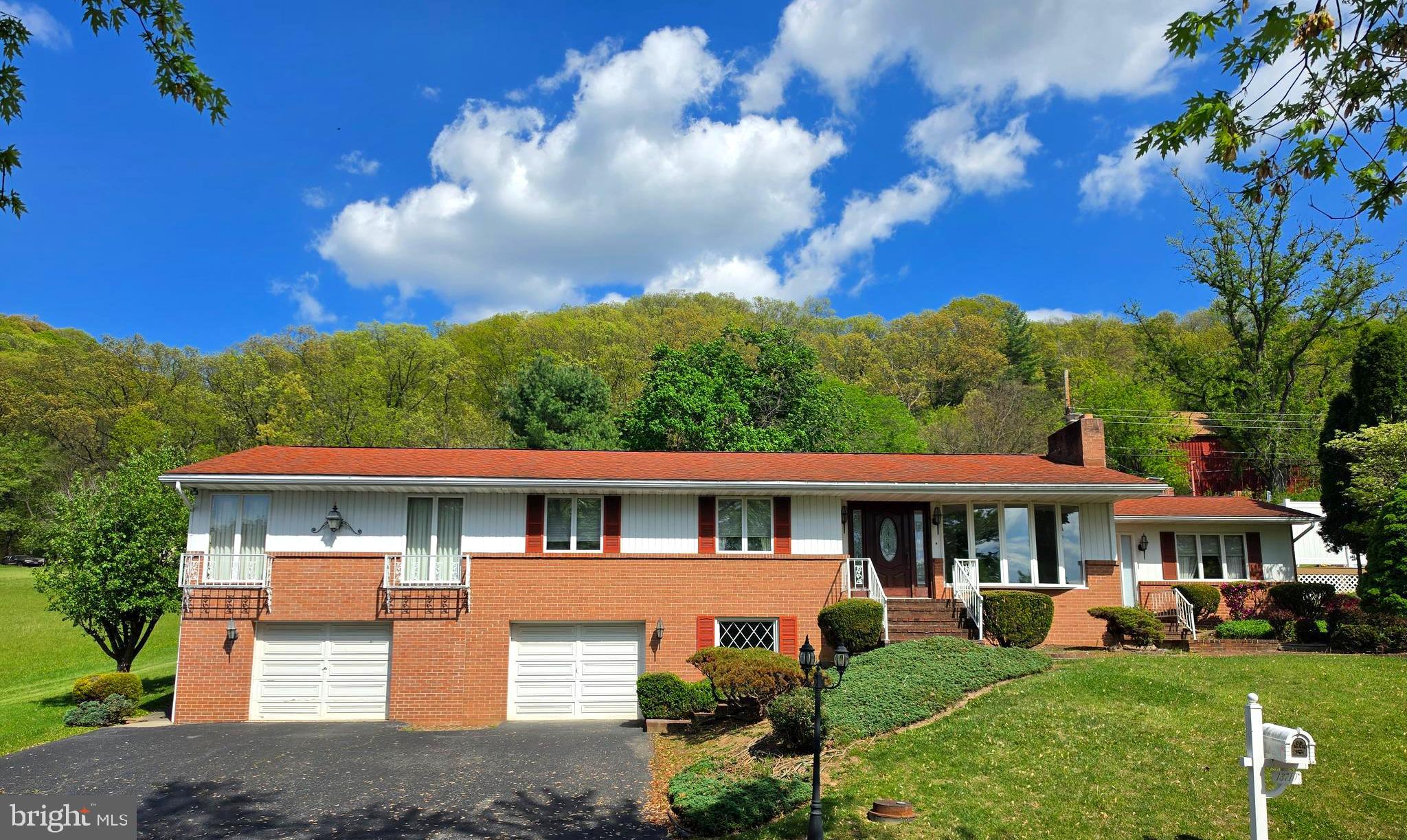 Stunning epansive 4 bedroom, 2.5 bedroom home. This well-maintained home sits at the end of a quiet street and offers beautiful city lights and mountain views. The fenced backyard features a covered rear porch (added in 2016), plus a private deck off the primary bedroom.  The spacious primary suite includes a full bath and walk-in closet as part of a thoughtful addition. Inside, you’ll find a bright Great Room off the kitchen with granite countertops—perfect for gathering and entertaining.  Elegant crown molding enhances the dining room (formerly the living room), reflecting true pride of ownership. Public services, central air, roof 7 years =/- and no through traffic.  Be sure to get a look before it is goes.