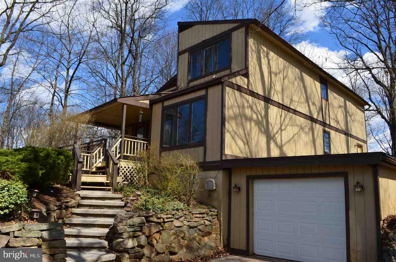 Enjoy Lake living in this home w/a lake view from your front porch First floor owners suite w/ensuite Open floor plan Kitchen includes all appliances Breakfast bar, plenty of cabinets & counter space family room/dining room powder room 3 bedroom 2 1/2 baths Tandem parking 2 car garage Come and enjoy all of the amenities that the lake has to offer