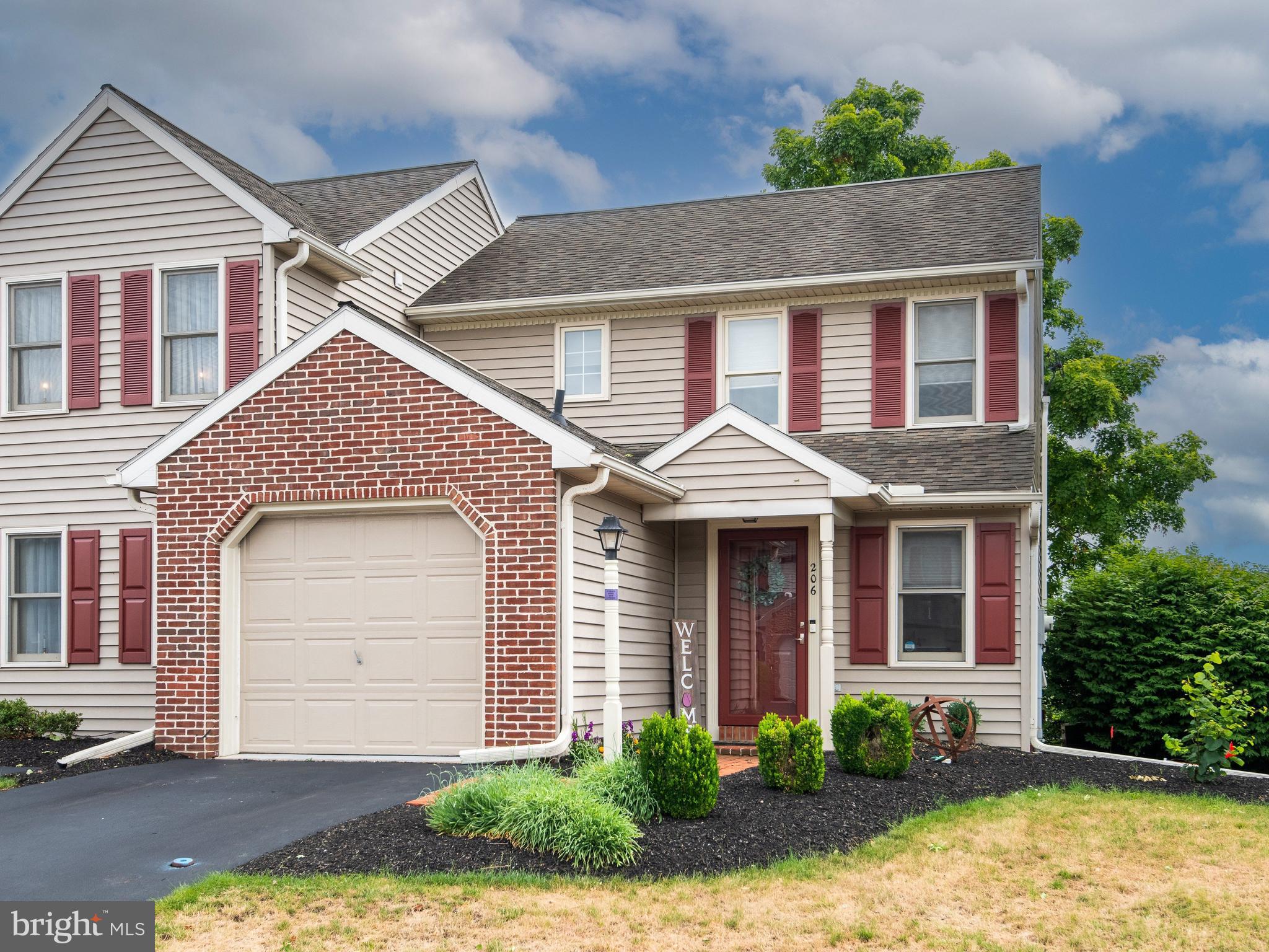 Welcome to this beautiful end-unit townhouse in the Brickyard community. From the moment you arrive and especially once you step inside, you’ll appreciate its inviting layout and thoughtful features. The main level offers an open floor plan centered around a stunning gourmet kitchen with quartz countertops, soft-close drawers, island seating, ample storage, a garbage disposal, and included appliances. The kitchen flows into the living room, creating an ideal space for entertaining. The dining area opens to the deck and rear yard, while a half bath and garage access complete the main level. Upstairs, you’ll find a spacious primary bedroom with generous closet space and a ceiling fan, along with a second guest bedroom. The laundry area is conveniently located on the second floor. The hall bathroom features large vanity, lots of storage, a tub/shower combination, and a skylight that fills the space with natural light. Pull-down stairs provide access to additional attic storage. The finished basement offers additional living space and is currently used as an office, exercise area, and art studio, leaving plenty of room to imagine your own possibilities. The community also offers access to the Rail Trail. As an added bonus, Ring Doorbell, Nest Thermostat and Keyless Entry are included with this sale.  Showing to begin at 5pm on Friday, July 10th.  Don’t wait—schedule your appointment today.