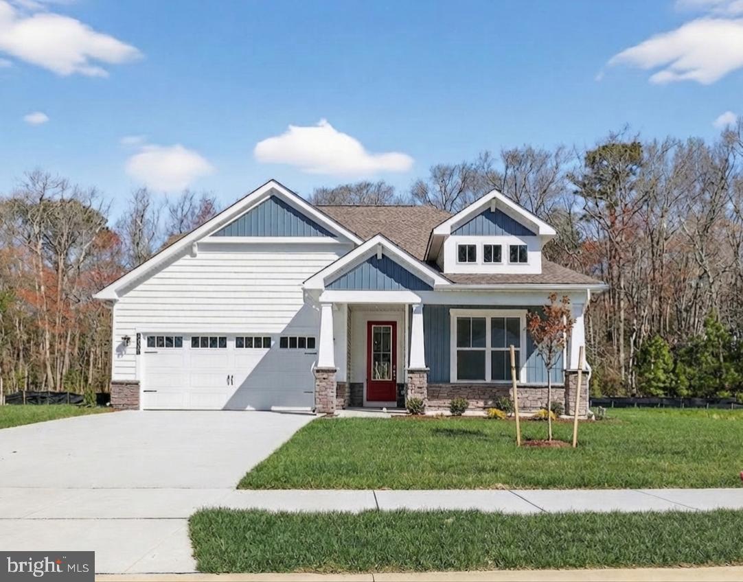 Move-In Ready NOW! Live just minutes from the ocean’s edge in Sandpiper Cove, a brand-new, coastal community of single-family homes perfectly nestled between Selbyville and Fenwick Island. Just 0.7 miles from Route 54 and just minutes from the Freeman Arts Pavilion, this community delivers the ideal blend of location, lifestyle, and luxury. With only 68 home sites, Sandpiper Cove offers an exclusive, close-knit atmosphere paired with resort-style amenities—including a private clubhouse, pool, fitness center, and scenic nature trails. The Tyndall is a single-story home tucked onto a private wooded homesite with peaceful pond views. Enjoy 3 bedrooms and 2 full baths thoughtfully laid out for privacy and comfort. This open-concept floorplan provides a spacious great room, corner kitchen, and bright breakfast nook. The serene primary suite includes a large walk-in closet and spa-inspired bath featuring a walk in shore with a built-in seat for comfort. With designer finishes throughout including an enhanced kitchen appliance package: featuring a stainless steel canopy hood, wall oven/microwave combo, French door refrigerator with bottom drawer freezer, quartz countertops, elegant flooring, custom tile work and more. This home is smart and sustainable as well and is built to the highest standards including Indoor AirPLUS® and Zero Energy Ready™ certified providing enhanced comfort, cleaner indoor air, and energy savings. Homes in this sought-after community are selling fast. Secure your spot at Sandpiper Cove today.