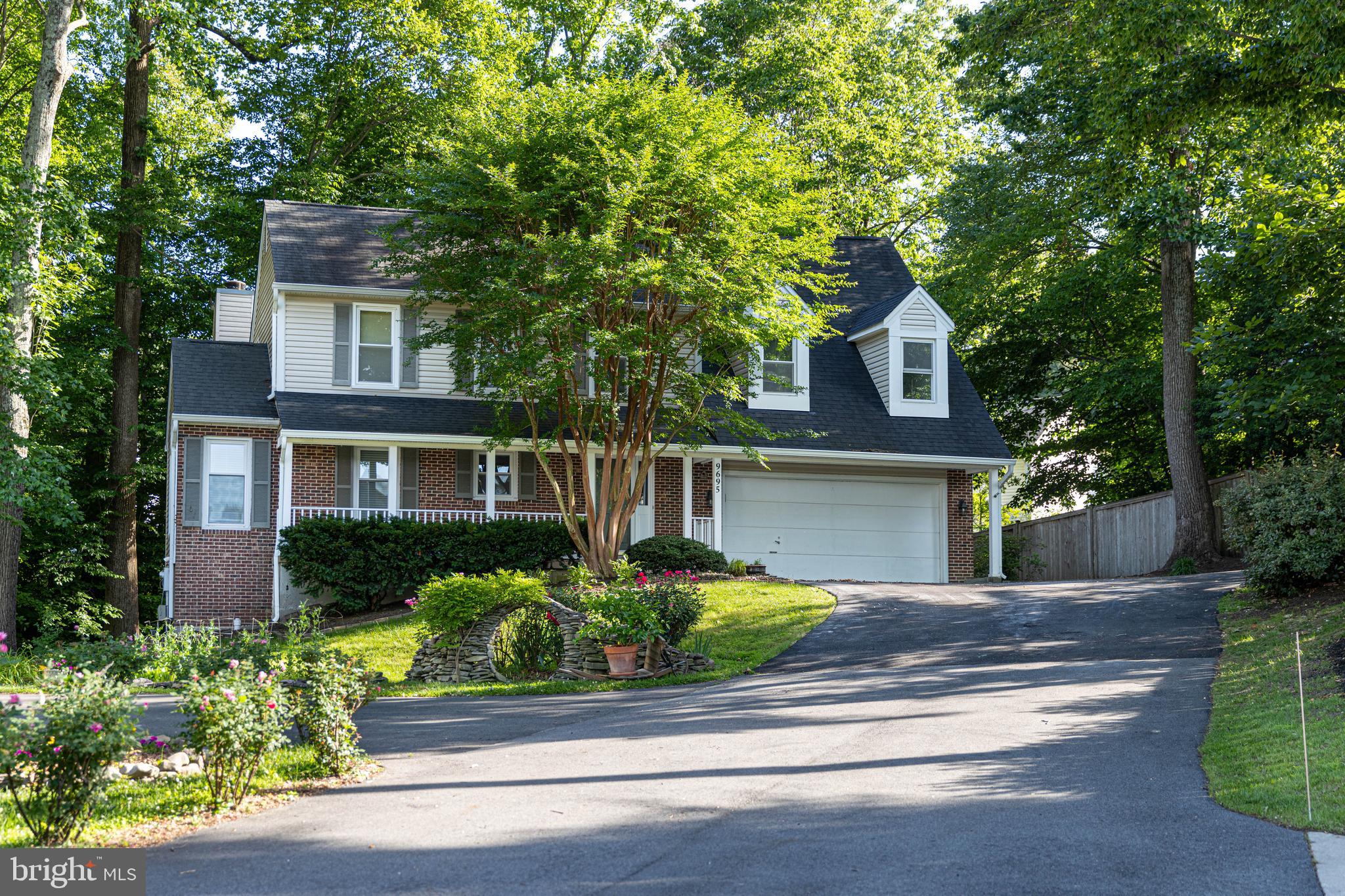 Welcome to 9695 Holly Oak Ct in Fairfax Station, a beautifully updated home tucked away at the end of a quiet lane and on a  cul-de-sac perfect for play and backing to peaceful trees for exceptional privacy. This light-filled home features soaring ceilings and a dramatic great room highlighted by a full wall of oversized windows that flood the space with natural light and showcase the serene wooded setting. The kitchen was beautifully updated in 2026 with quartz countertops and stainless steel appliances, creating a modern and functional space for cooking and entertaining. Fresh paint throughout the home (2026) and a newly paved driveway (2026) add to the move-in ready appeal. Outdoor living is equally inviting with a charming front porch and a spacious rear deck overlooking the trees. The finished basement expands the living space and includes a full bedroom with egress added in 2026 along with a family room, a dedicated spacious storage room & rough-in for a full bath. Perfectly located in desirable Fairfax Station near parks, commuter routes, Metro, and the VRE, this home offers privacy, natural beauty, and thoughtful updates throughout.

This friendly and close-knit community is highly sought after with its prime location in between Lake Mercer and Burke Lake and the myriad  of trails intersecting the area!  This active community has associate membership to two Crosspointe pools and is proud to be part of Silverbrook elementary and the South County School pyramid.  Add fantastic commute options to this great location and you have the best of suburban living tucked into nature. Don’t delay in viewing this lovely home!