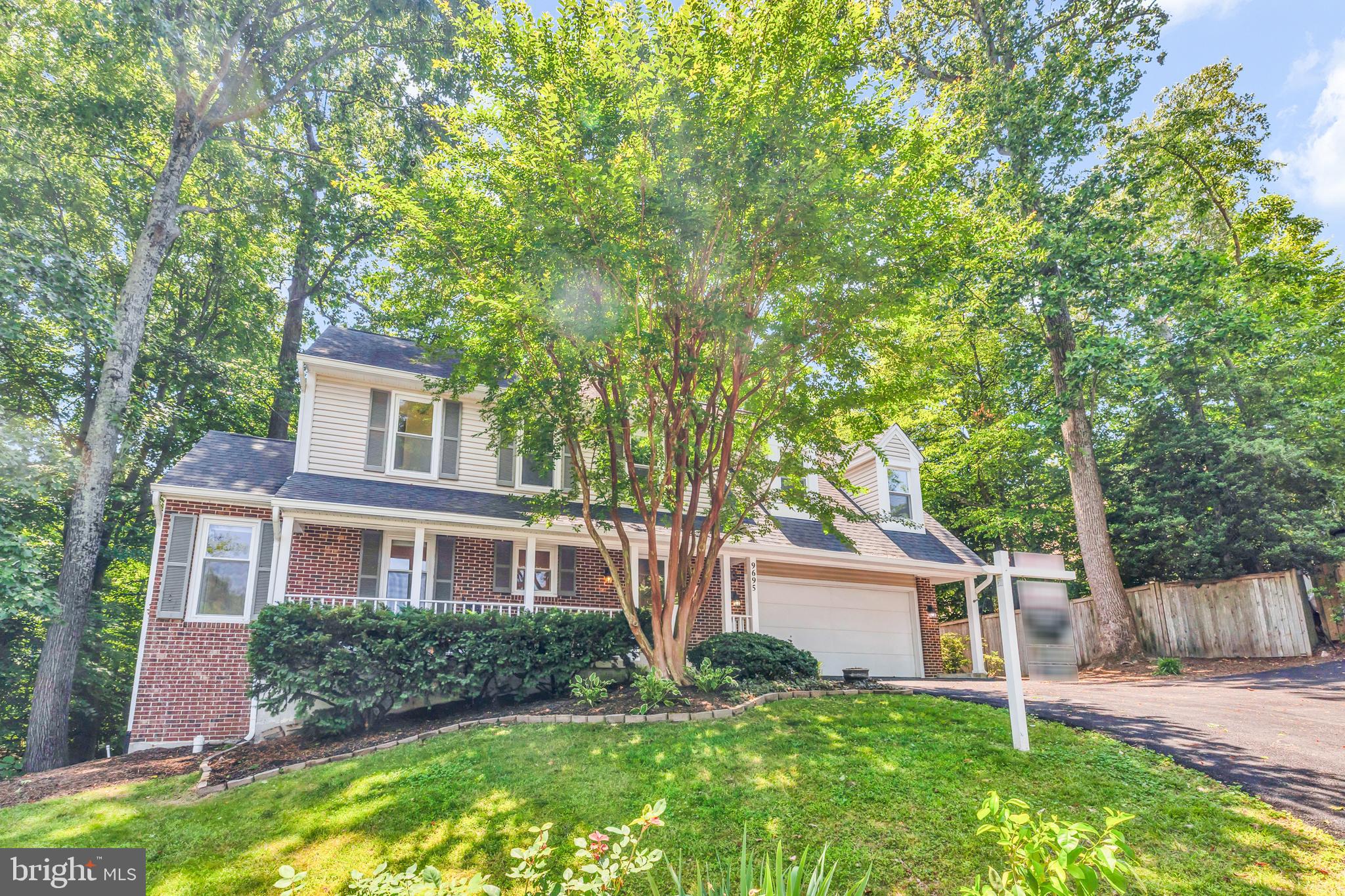 Welcome to 9695 Holly Oak Ct in Fairfax Station, a beautifully updated home tucked away at the end of a quiet lane and on a  cul-de-sac perfect for play and backing to peaceful trees for exceptional privacy. This light-filled home features soaring ceilings and a dramatic great room highlighted by a full wall of oversized windows that flood the space with natural light and showcase the serene wooded setting. The kitchen was beautifully updated in 2026 with quartz countertops and stainless steel appliances, creating a modern and functional space for cooking and entertaining. Fresh paint throughout the home (2026) and a newly paved driveway (2026) add to the move-in ready appeal. Outdoor living is equally inviting with a charming front porch and a spacious rear deck overlooking the trees. The finished basement expands the living space and includes a full bedroom with egress added in 2026 along with a family room, a dedicated spacious storage room & rough-in for a full bath. Perfectly located in desirable Fairfax Station near parks, commuter routes, Metro, and the VRE, this home offers privacy, natural beauty, and thoughtful updates throughout.

This friendly and close-knit community is highly sought after with its prime location in between Lake Mercer and Burke Lake and the myriad  of trails intersecting the area!  This active community has associate membership to two Crosspointe pools and is proud to be part of Silverbrook elementary and the South County School pyramid.  Add fantastic commute options to this great location and you have the best of suburban living tucked into nature. Don’t delay in viewing this lovely home!
