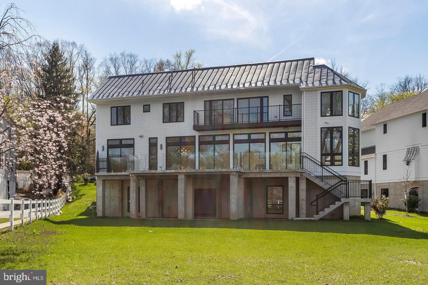 Luxury and never the same view twice!!  A Modern Masterpiece for the Sophisticated Buyer
Gladwyne, PA – Lower Merion School District

For those seeking luxury without the maintenance, privacy without isolation, and elegance with an edge – welcome to 310 River Rd.

This stunning glass-wrapped residence offers the perfect blend of low-maintenance living and architectural brilliance along the peaceful banks of the Schuylkill River. Whether you're downsizing but not ready to give up luxury, or you’re a single professional who wants it all, this home delivers.

Top Reasons You'll Love Living Here:
Exclusive Gladwyne Zip Code – One of the most coveted Main Line locations, known for prestige, privacy, and access to everything.

Breathtaking Water Views – Floor-to-ceiling glass offers a front-row seat to nature, every single day.

No Compromise Design – Built by Rufo Properties, designed by Bissinger—this is a showpiece built to impress and built to last.

Lock-and-Leave Simplicity – Concrete foundation, radiant heat, hurricane-grade structure = low upkeep, high peace of mind.

Chef-Quality Kitchen – Waterfall island, quartz, Wolf & Sub-Zero, one-piece backsplash. If you cook, you’ll fall in love. If you don’t, it still looks amazing on Instagram.

Smart Tech Everything – Fully integrated smart home system, custom cabinetry, heated 3-car garage with commercial-grade doors.

Private Outdoor Living – Multiple decks, waterfront serenity, and just minutes to Center City or the Main Line’s best spots.

Ideal for:
Downsizers with older kids out of the house, who still want space and style

A professional or entrepreneur who needs privacy, presence, and a home office with a view

Someone ready for the next chapter—simplified, elevated, and inspiring

Live minutes from:

Center City (20 minutes to West River Drive or I-76)

Top-ranked Lower Merion schools

Boutiques, golf, restaurants, and trails throughout Gladwyne & the Main Line

310 River Road isn’t just a home. It’s a fresh start, a bold statement, and a daily experience of refined living.