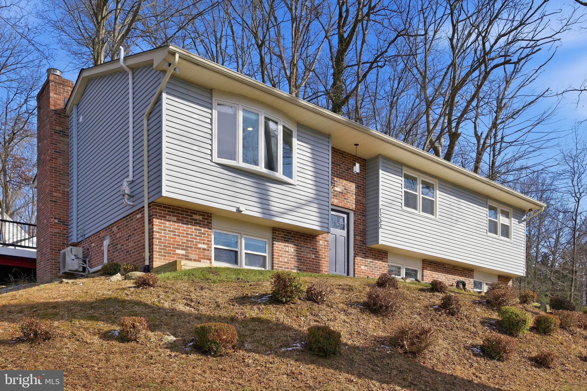Welcome home to this beautifully renovated 4-bedroom, 2-full-bathroom split foyer home within the Fallston School District! This lovely home offers a thoughtfully designed layout and modern upgrades throughout. The main living room is bright and inviting, featuring refinished hardwood floors, accent mantle with an electric fireplace and an open, airy feel that flows seamlessly into the kitchen—ideal for both everyday living and entertaining.

The gourmet kitchen, fully renovated in 2024, is a true highlight, boasting a large quartz island, stylish tile backsplash, and abundant cabinet space for storage and functionality. Whether you’re hosting guests or preparing weeknight meals, this kitchen delivers both style and practicality. Just off the kitchen is a spacious dining area that comfortably accommodates a large dining table, with a walkout to the brand-new rear deck (2025)—perfect for indoor-outdoor entertaining, summer gatherings, or morning coffee.

Additionally upstairs you will find 3 large bedrooms and a new full bathroom with tub renovated in 2024 offering a fresh modern feel.

The lower level provides additional finished living space, completed in 2021, perfect for a family room, home office, or recreation area, the fourth bedroom, laundry room with a new all in one washer and dryer (2024) and tons of storage space with its on side entrance to the home. 

Recent major improvements include floors sanded and refinished (2024), a brand new deck (2025) ideal for outdoor entertaining, new front and side exterior doors (2025), a new roof (2021), and an impressive 6-car driveway (2025), providing rare and valuable off-street parking.

In the Spring/Summer the trees cover the 4 way stop and provide ample privacy from neighboring properties. With a smart split foyer design, extensive updates, and move-in-ready condition, this home offers comfort, flexibility, and convenience—an excellent opportunity for today’s buyer.